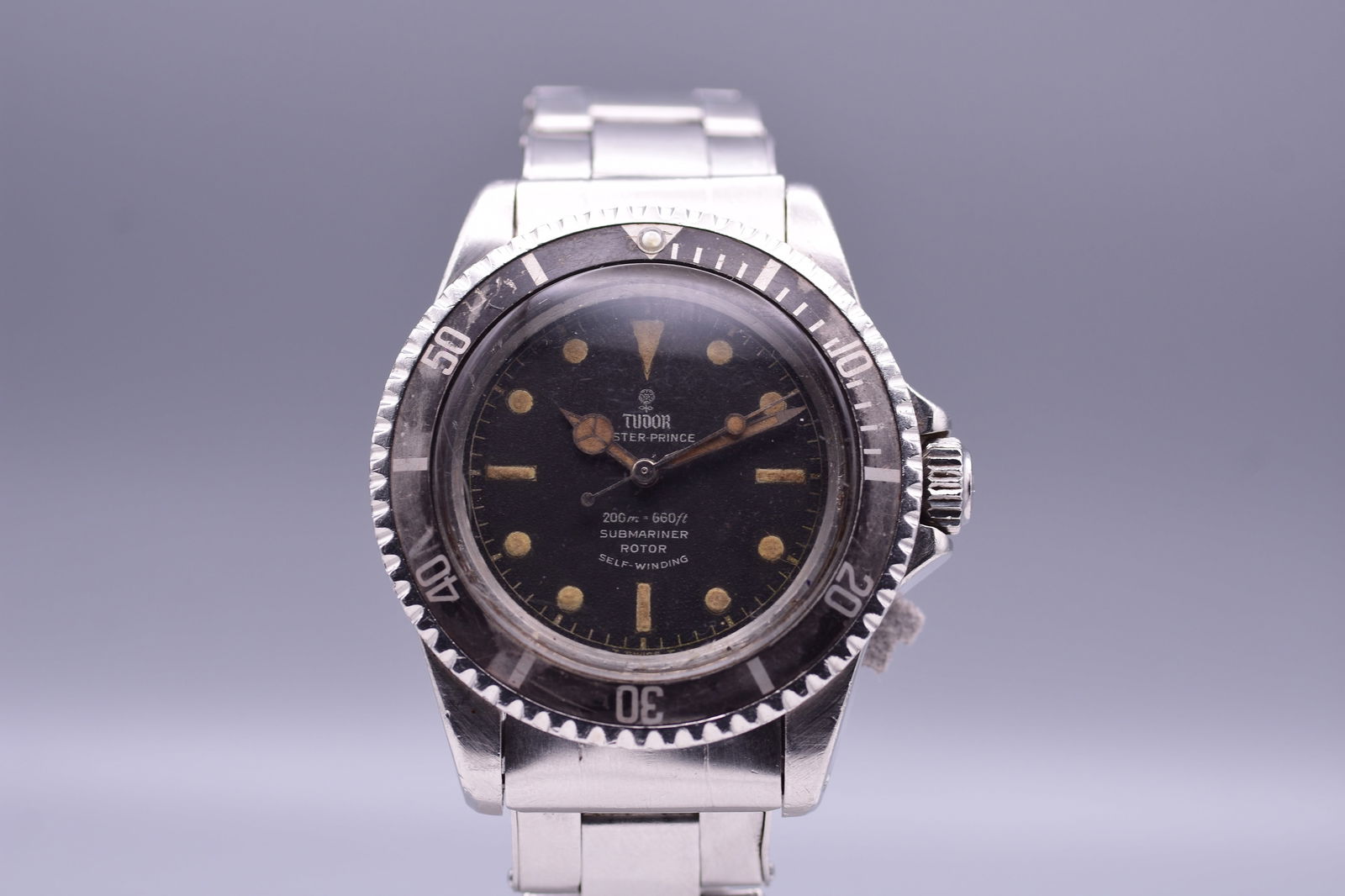 Tudor Submariner Ref. 7928 "Smiley" Gilt Dial Divers' Wristwatch The "Rose" Diver C.1964: Tudor Submariner Ref. 7928 "Smiley" Gilt Dial Divers' Wristwatch The "Rose" Diver C.1964 this remarkably handsome Tudor Oyster Prince Submariner, Reference 7928, epitomises the golden era of mid-centu