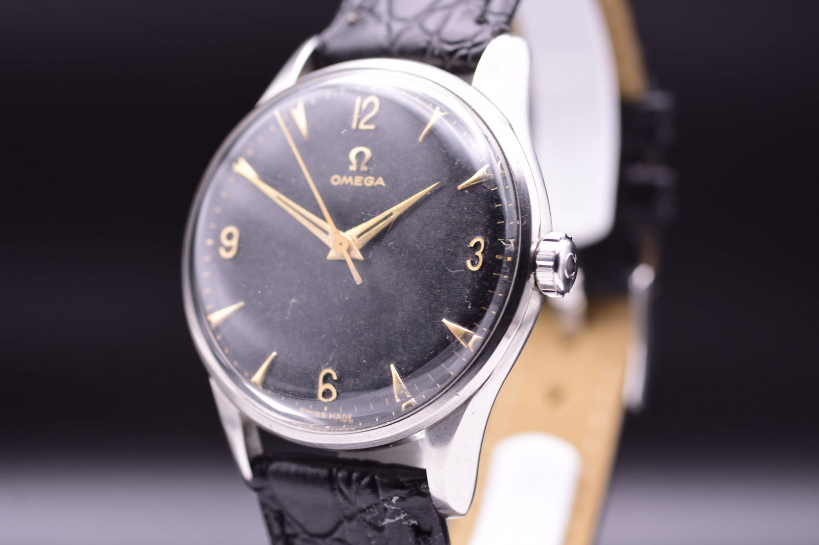 Omega 'Jumbo' Reference 2810-1 Original Black Gilt Explorer Dial Wristwatch 1956: Omega 'Jumbo' Reference 2810-1 Original Black Gilt Explorer Dial Wristwatch 1956 Presented in exemplary condition, this refined 1956 Omega Reference 2810-1 is a superlative example of mid-century Swis