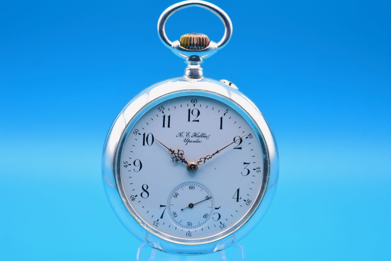 IWC Schaffhausen Pocket Watch, Retailed by K. E. Hallin, Uppsala, c.1899 .800 Silver: IWC Schaffhausen Pocket Watch, Retailed by K. E. Hallin, Uppsala, c.1899 .800 Silver This open-faced silver pocket watch was manufactured by the prestigious International Watch Co. (IWC), Schaffhausen