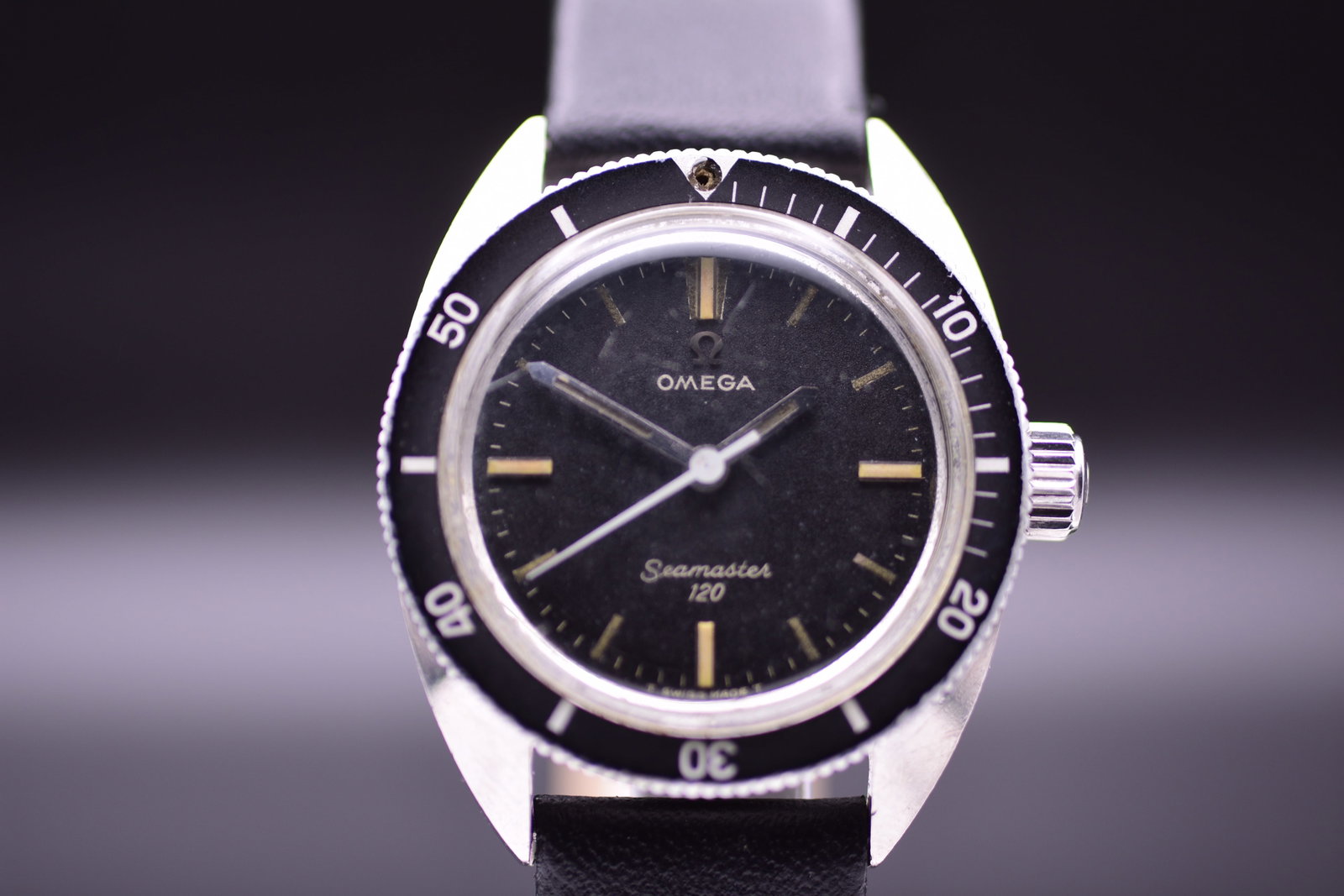 Omega 30mm Ref. 535.007 Diver’s Wristwatch Matte Black Dial Omega Buckle 1967: Omega 30mm Ref. 535.007 Diver’s Wristwatch Matte Black Dial Omega Buckle 1967This rare and highly sought after vintage Omega Seamaster 120 midsize diver's wristwatch features a beautifully propo