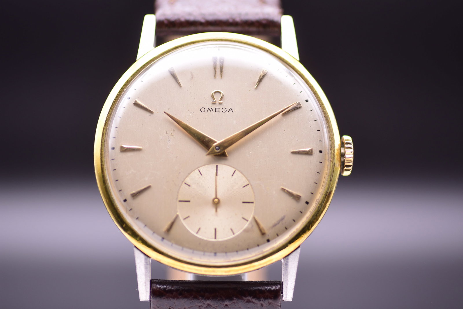 Omega Jumbo Oversized Ref. 2272-6 Two Tone Steel & Gold Dress Watch 1943: Omega Jumbo Oversized Ref. 2272-6 Two Tone Steel & Gold Dress Watch 1943This exceptionally elegant and highly collectable vintage Omega Jumbo manual wind wristwatch features an oversized 37mm two-tone