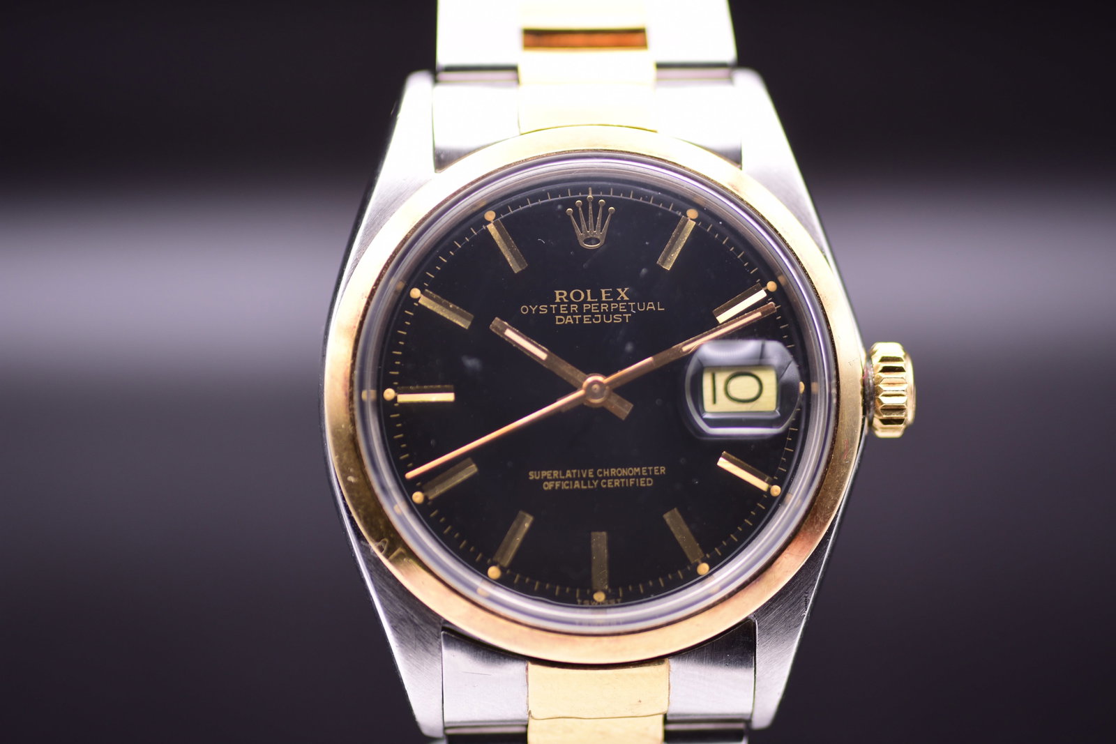 Oyster Perpetual Datejust 1600 Stainless Steel 18k Gold Wristwatch 1963 Black Dial: Oyster Perpetual Datejust 1600 Stainless Steel 18k Gold Wristwatch 1963 Black DialRolex Oyster Perpetual Datejust reference 1600 is crafted in a handsome bi-metal combination of stainless steel and 18