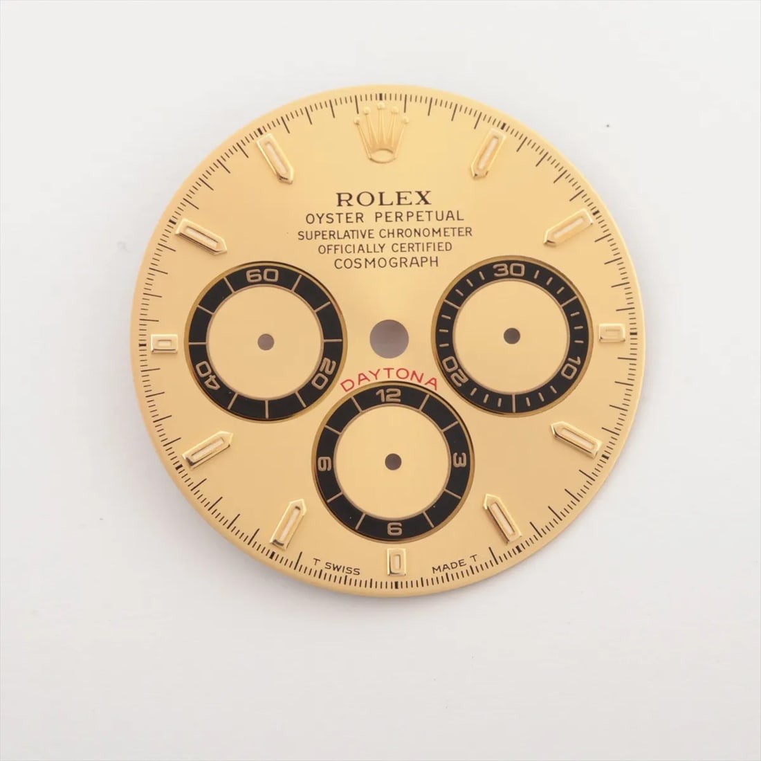 Rolex Daytona New Old Stock Champagne Daytona Dial & Hands Cal 4030, Ref. 13/16528-15 c1995: Rolex Daytona New Old Stock Champagne Daytona Dial & Hands Cal 4030, Ref. 13/16528-15 c1995Rolex Cosmograph Daytona factory replacement dial packaged in its original protective sleeve. Bearing the off