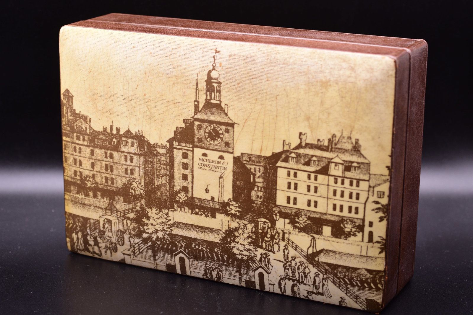 Vacheron Constantin Lacquered Wood Watch Presentation Case Box Rare Lithograph Tour de l'Île Geneva: Vacheron Constantin Lacquered Wood Watch Presentation Case Box Rare Lithograph Tour de l'Île Geneva Scene Vacheron Constantin presentation box from the 1950s or 1960s, featuring a detailed lithograph
