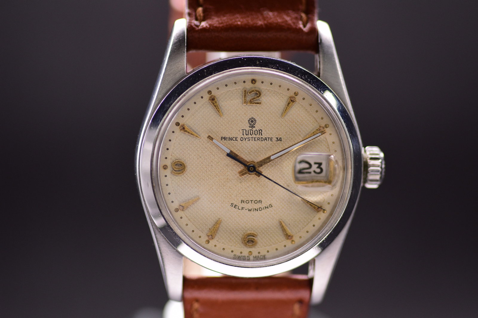 Tudor Prince Oysterdate Reference 7914 Honeycomb Dial 1957: An exceptional mid century timepiece, this vintage Tudor showcases a rare and highly collectible honeycomb textured dial. It features a historic automatic movement housed within a legendary Rolex pate