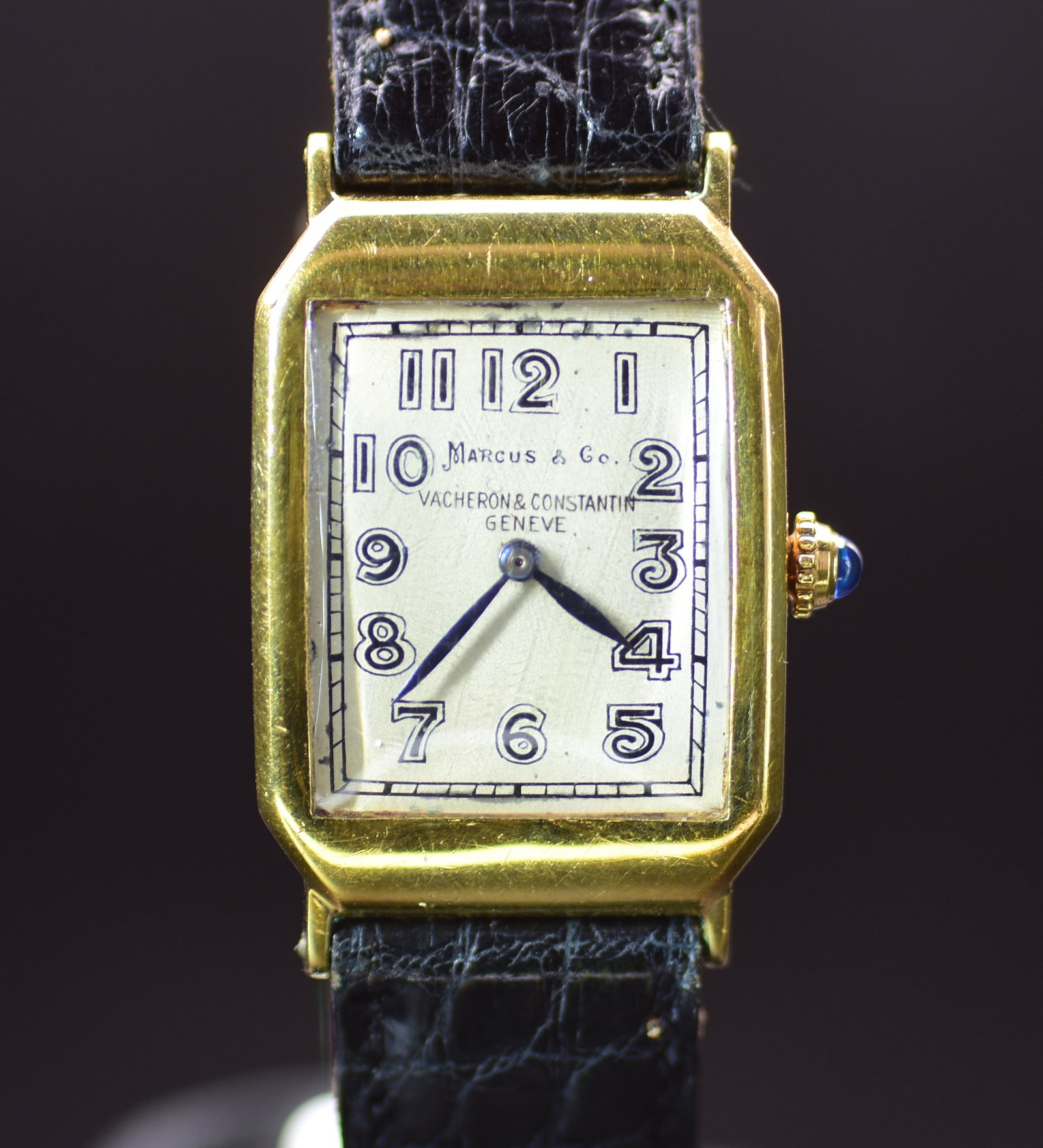 Vacheron & Constantin Double Signed Marcus & Co. Art Deco 18k Gold Luxury Watch: From the golden era of the Art Deco movement. Housed in a distinctively stepped 18k yellow gold cut-corner rectangular case, this piece boasts an incredibly rare, authentic double signed dial bearing 