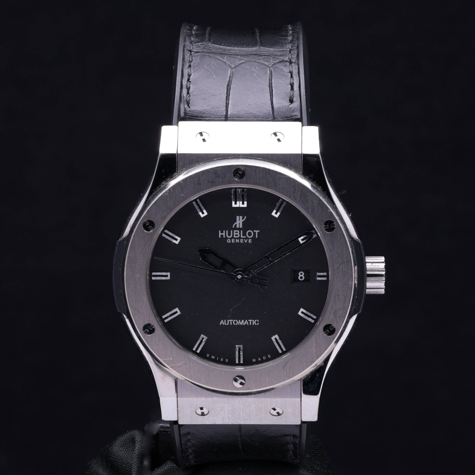 Hublot Classic Fusion Titanium Black Dial 542.NX.1171.RX Circa 2018: Title: Hublot Classic Fusion Titanium Black Dial 542.NX.1171.RX Circa 2018 Catalogue Description: A contemporary titanium automatic calendar wristwatch. The minimalist matte black dial features applie