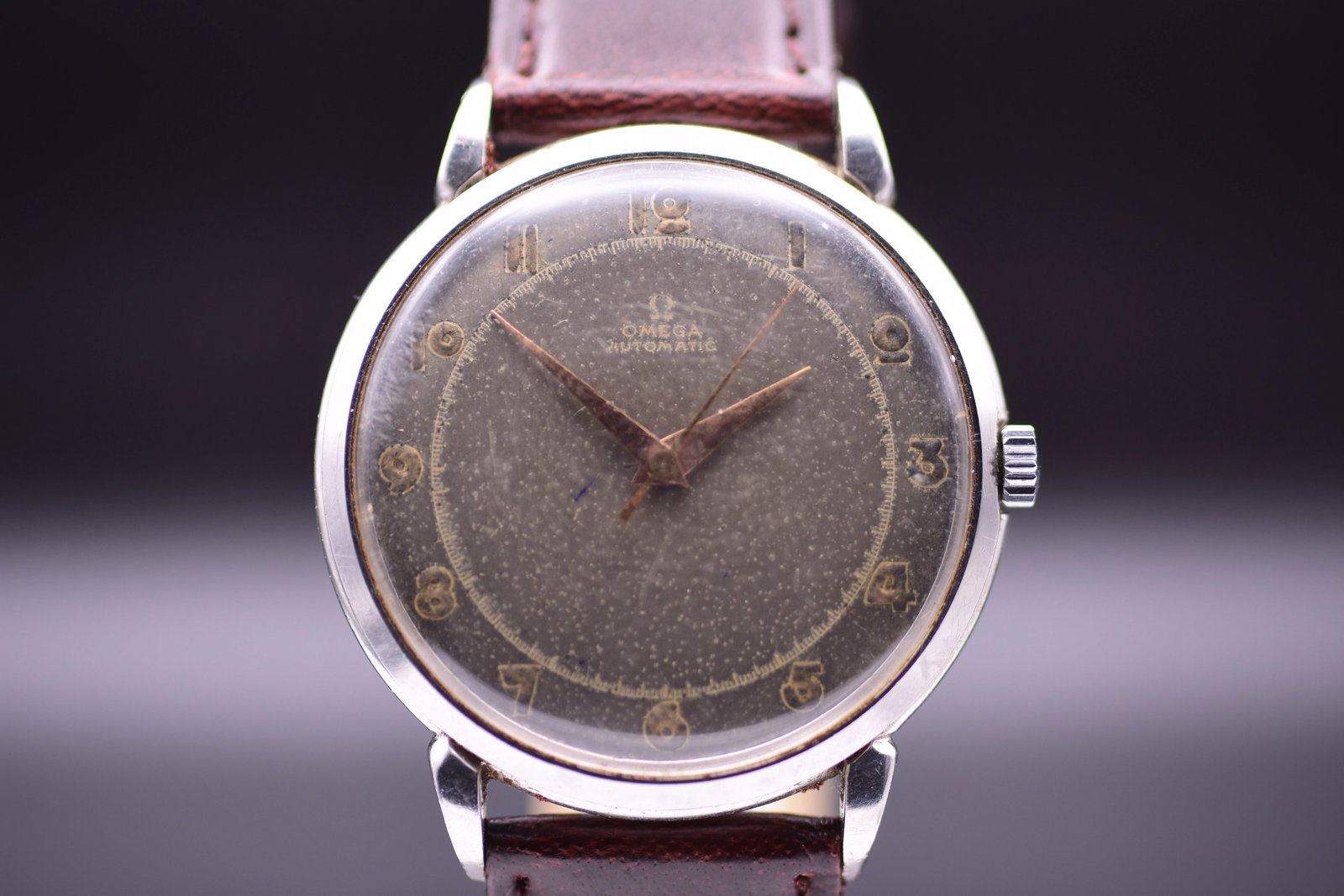 Omega Pre Seamaster 2446 1 H Black Sector Stardust Patina Dial Bumper Automatic 1951: Title: Omega Pre Seamaster 2446 1 H Black Sector Stardust Patina Dial Bumper Automatic 1951 Catalogue Description: An exceptionally rare and visually striking vintage stainless steel bumper automatic 