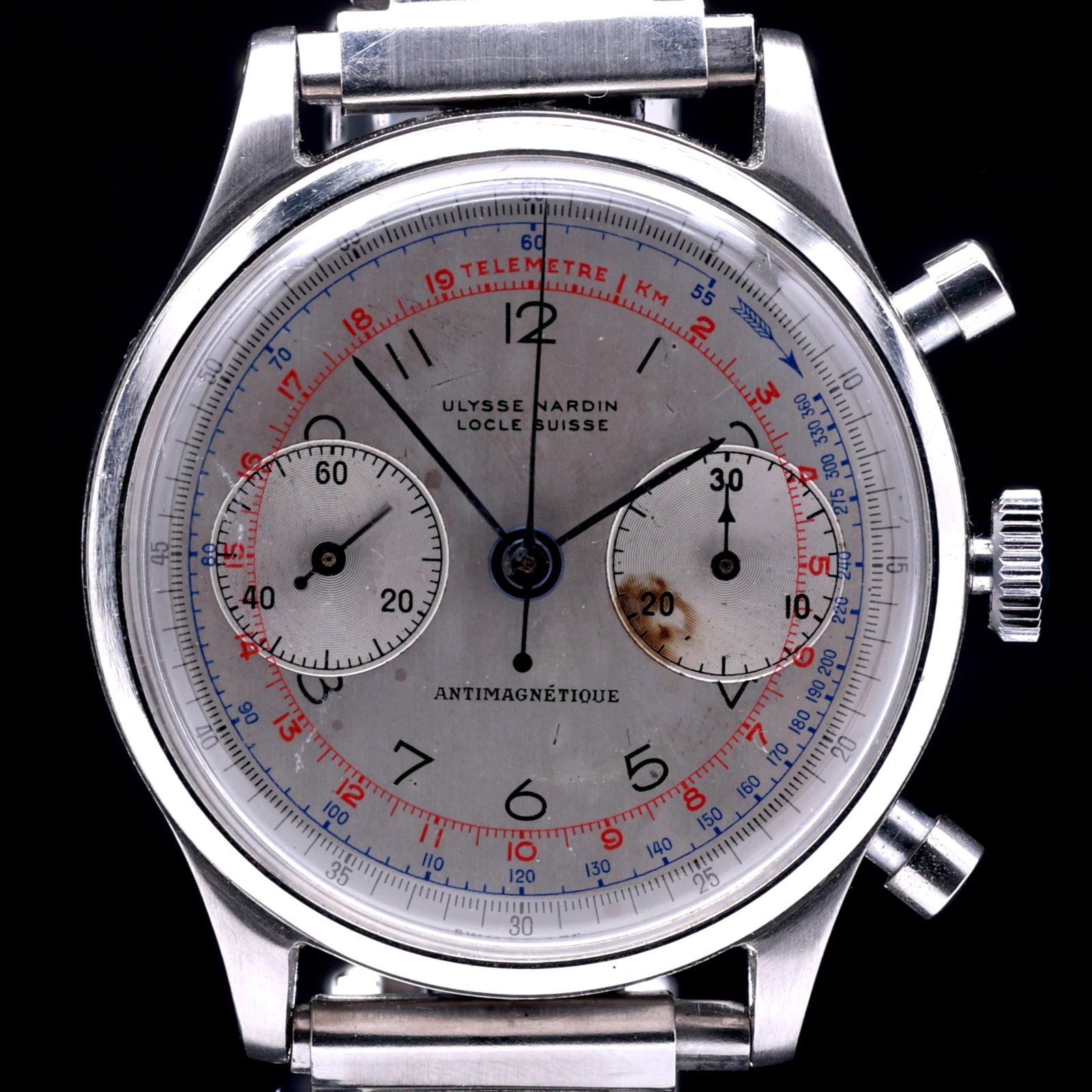 Ulysse Nardin Jumbo Cornes de Vaches Bi Compax Chronograph Silver Multi Scale Dial 1948: Title: Ulysse Nardin Jumbo Cornes de Vaches Bi Compax Chronograph Silver Multi Scale Dial 1948 Catalogue Description: A highly collectible and remarkably preserved example of a vintage Ulysse Nardin c