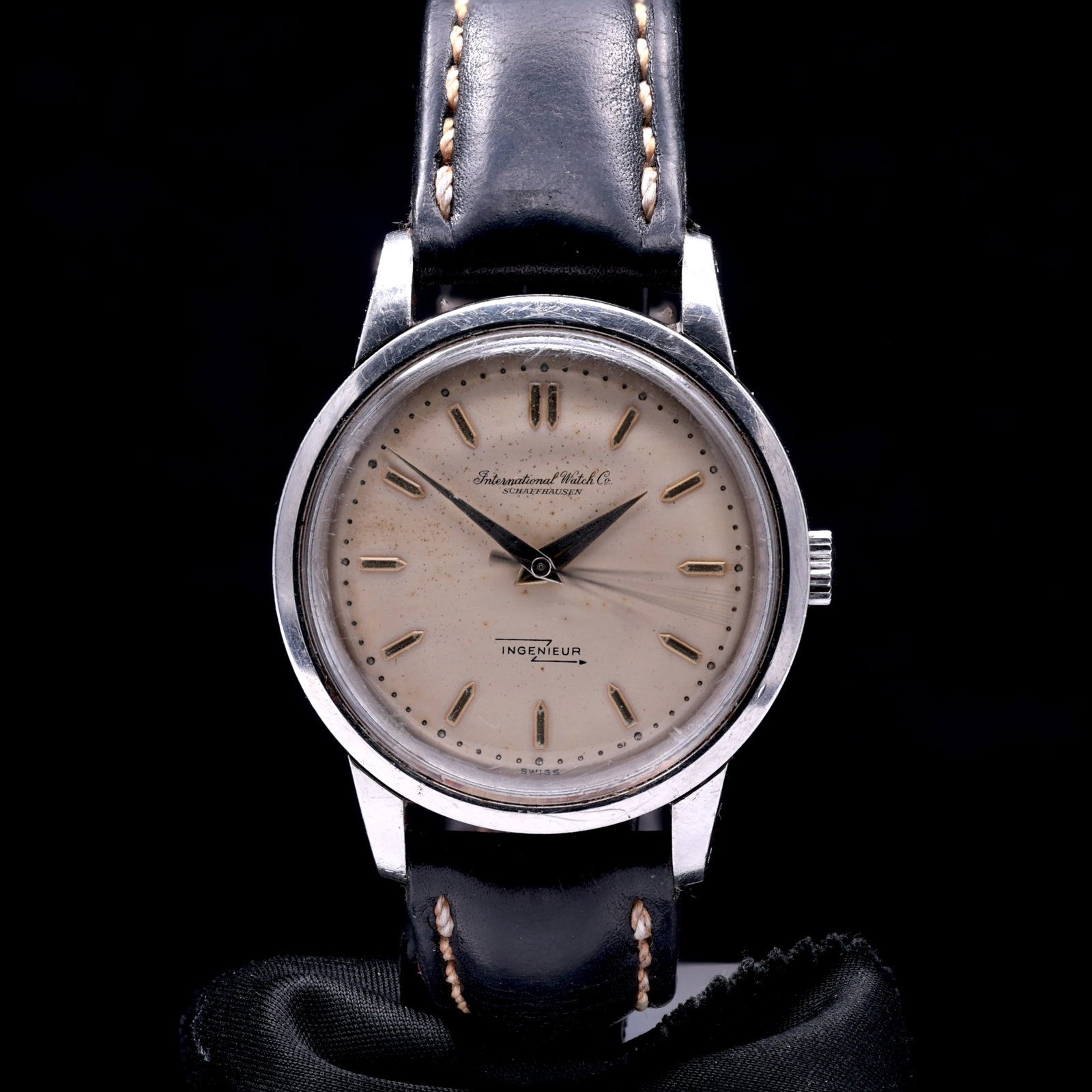 IWC Ingenieur Ref 666 Stainless Steel Wristwatch Cal. 853 Cream Dial 1950s: Title: IWC Ingenieur 666 Cream Dial Dauphine Hands Catalogue Description: An automatic winding stainless steel anti magnetic wristwatch. The cream dial shows a uniform natural age related patina with 