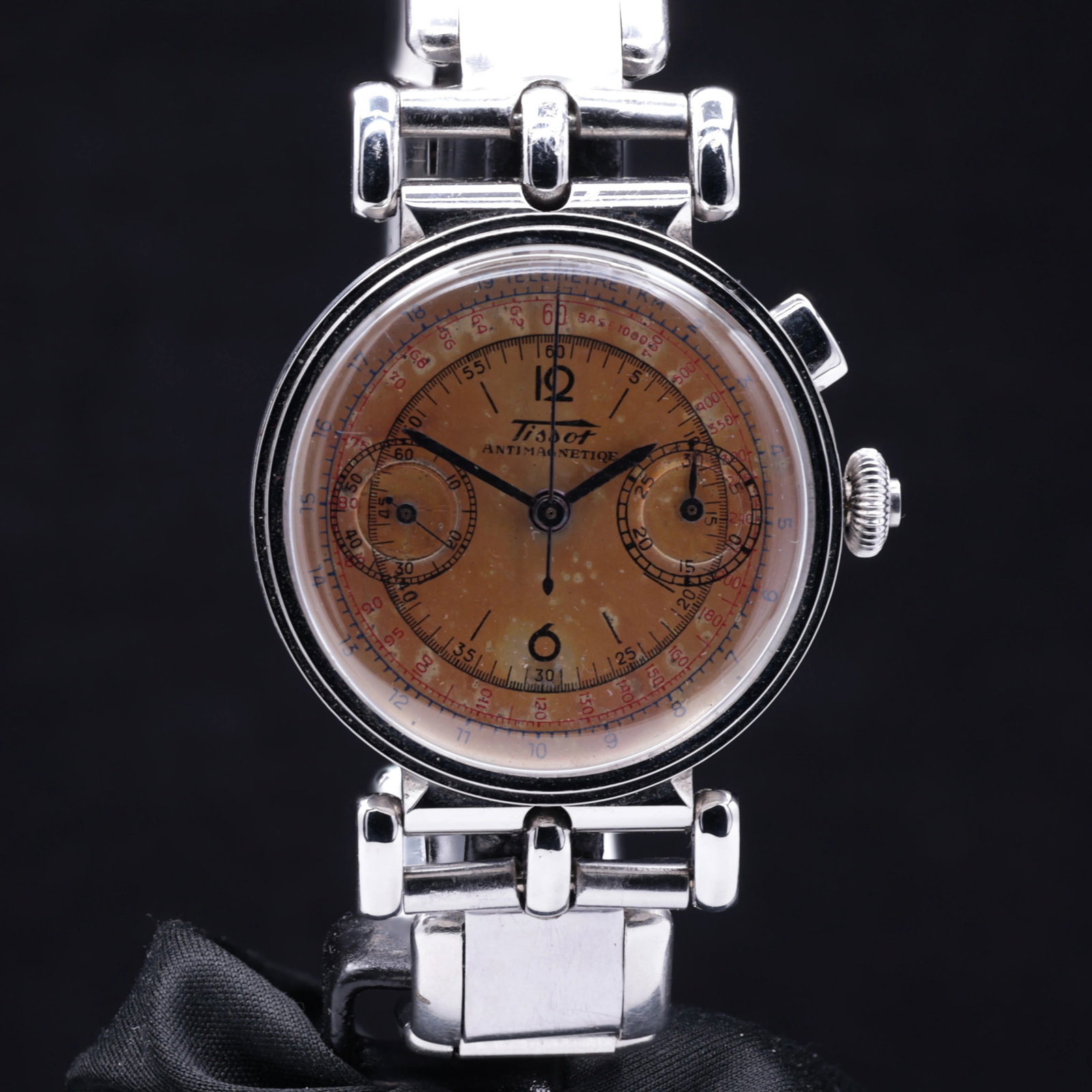 Tissot Chronograph Antimagnetique 6152 1940s Staybrite Stainless Steel Articulated Lugs Copper: Title: Tissot Chronograph Antimagnetique 6152 1940s Staybrite Stainless Steel Articulated Lugs Copper Salmon Dial Catalogue Description: Tissot Chronograph Antimagnetique vintage mechanical wristwatch