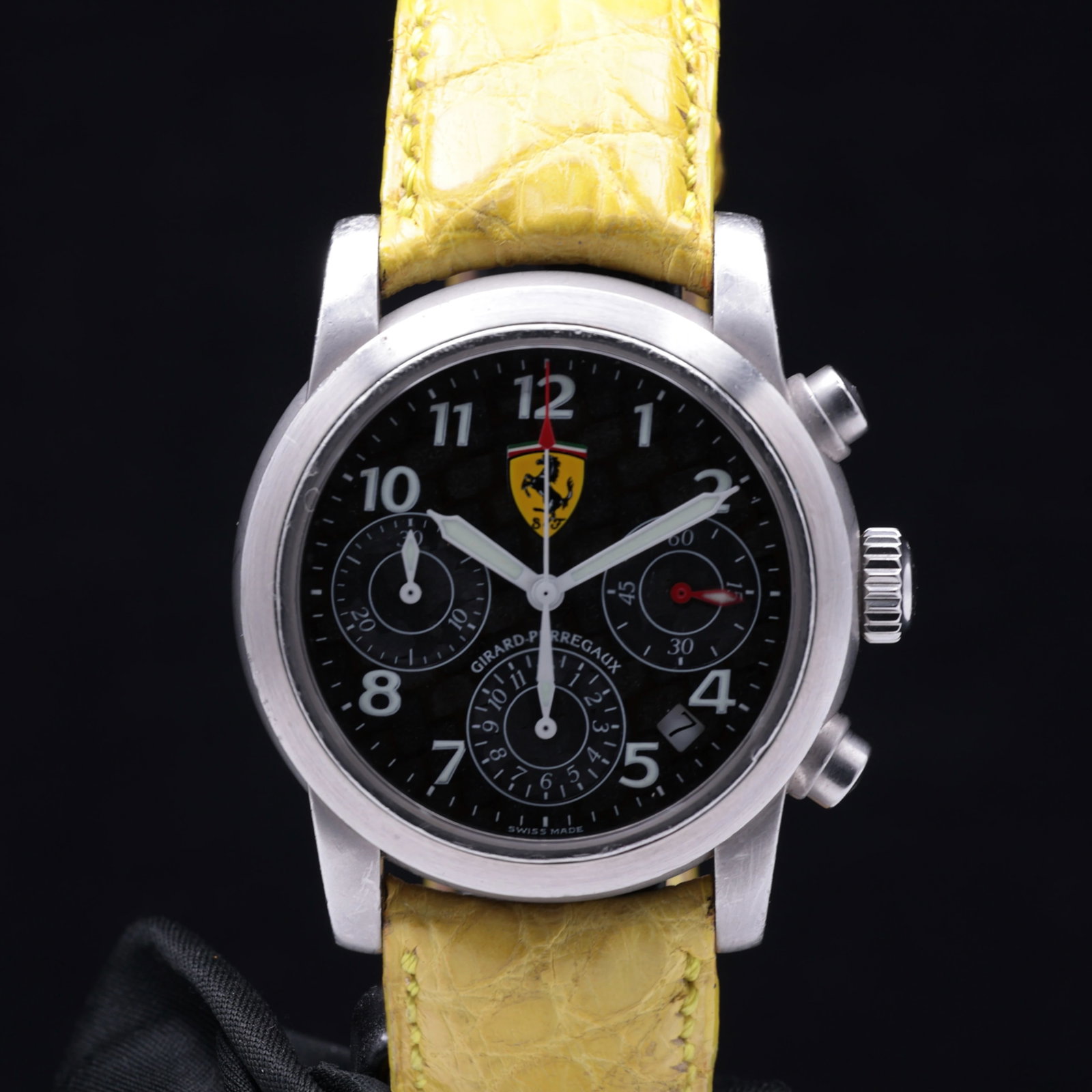 Girard Perregaux Ferrari Chronograph 8020 Circa 1990s Stainless Steel Yellow Exotic Alligator Strap: Title: Girard Perregaux Ferrari Chronograph 8020 Circa 1990s Stainless Steel Yellow Exotic Alligator Strap Catalogue Description: An automatic stainless steel calendar chronograph wristwatch made in c