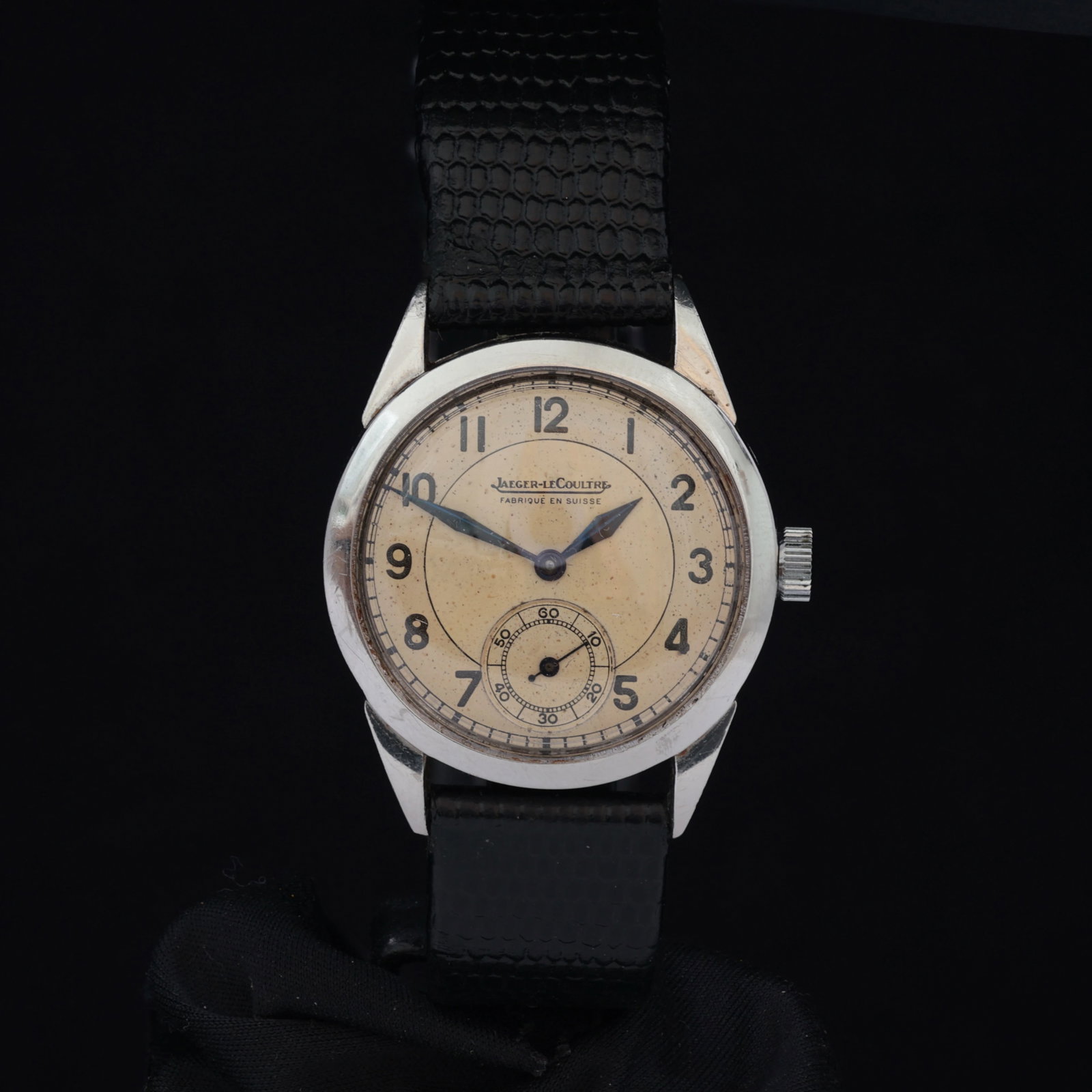 Jaeger LeCoultre Military Style Sub Second Circa 1940s Stainless Steel Two Tone Dial Patina: Title: Jaeger LeCoultre Military Style Sub Second Circa 1940s Stainless Steel Two Tone Dial Patina Catalogue Description: A manual wind stainless steel military style wristwatch. The silvered two tone