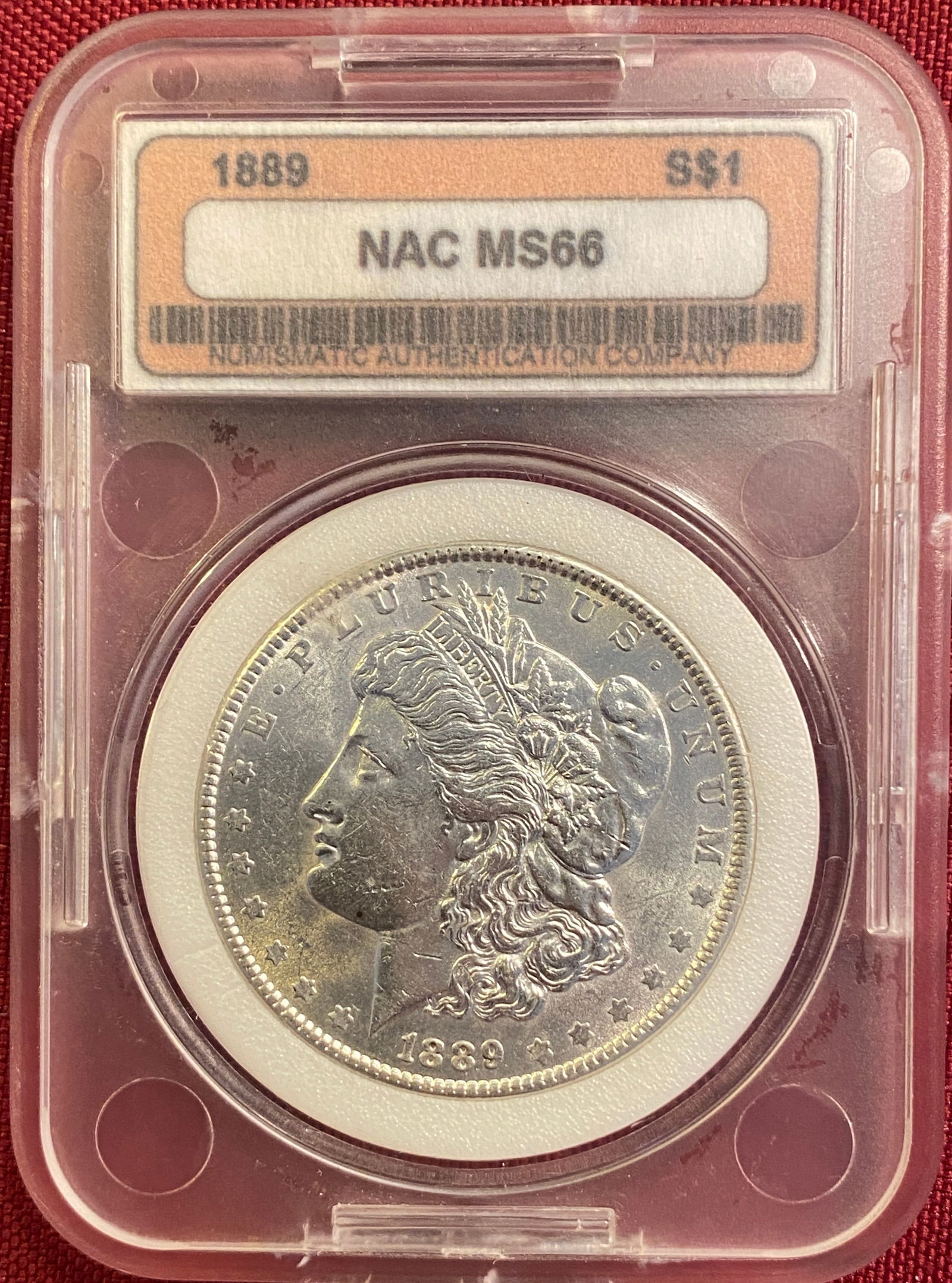 Graded 1889 Morgan Silver Dollar - MS66 by NAC (1 of 3)