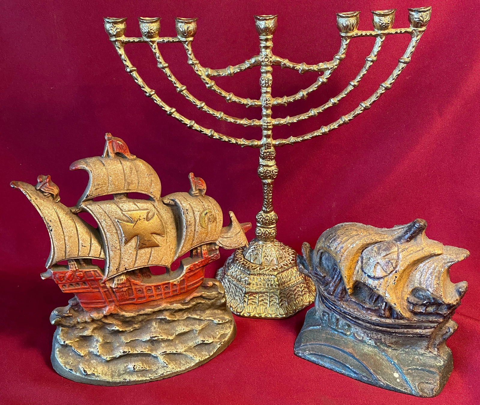Two Cast Iron Ship Doorstops & Brass Menorah: Two Cast Iron Ship Doorstops & Brass Menorah