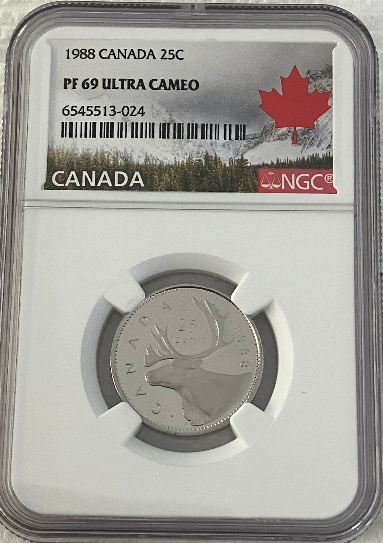 Graded 1988 Canadian Silver QuarterPF69 Ultra Cameo by NGC (1 of 3)