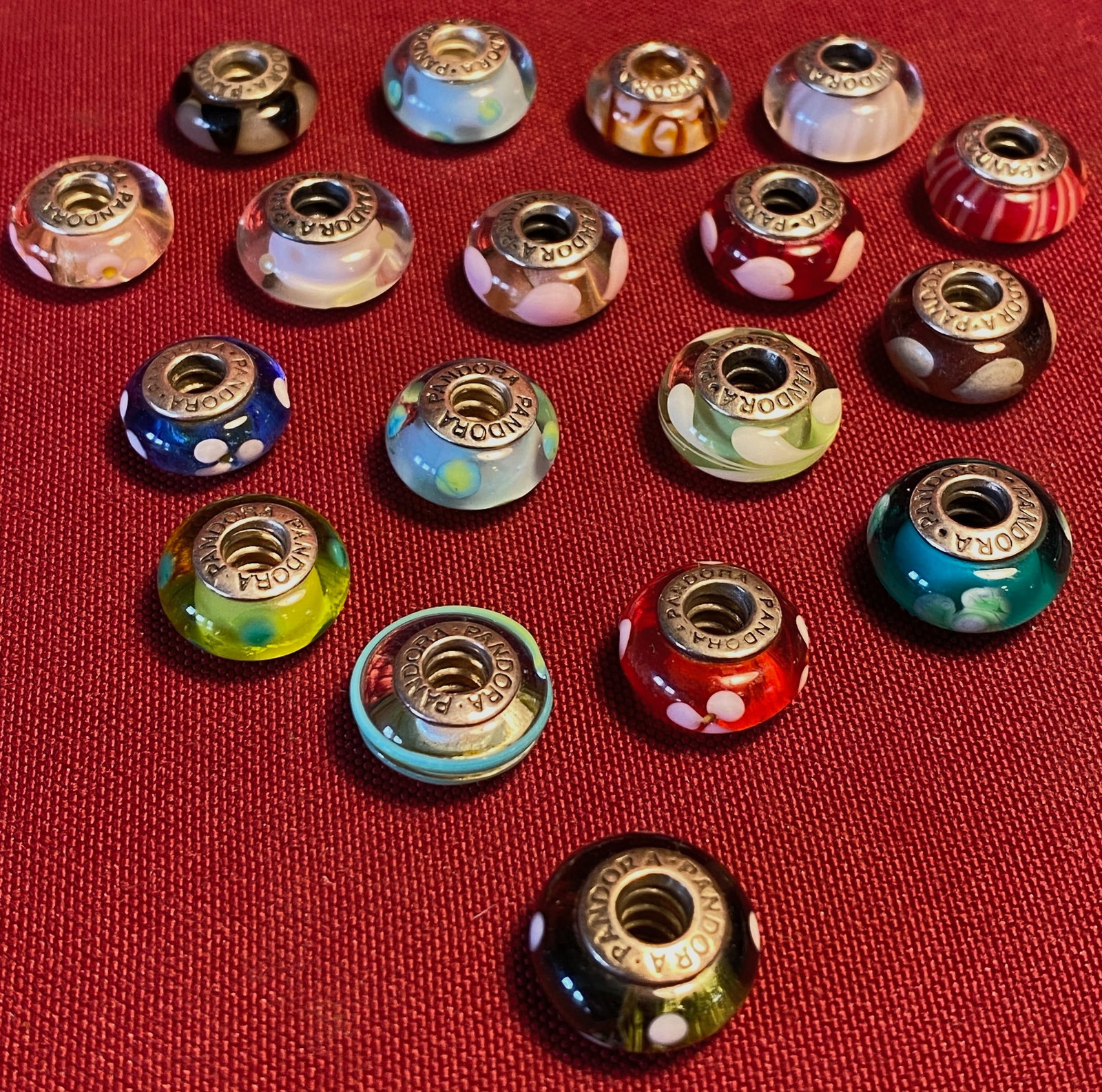 Eighteen Pandora Sterling Silver and Glass Beads: Eighteen Pandora Sterling Silver and Glass Beads