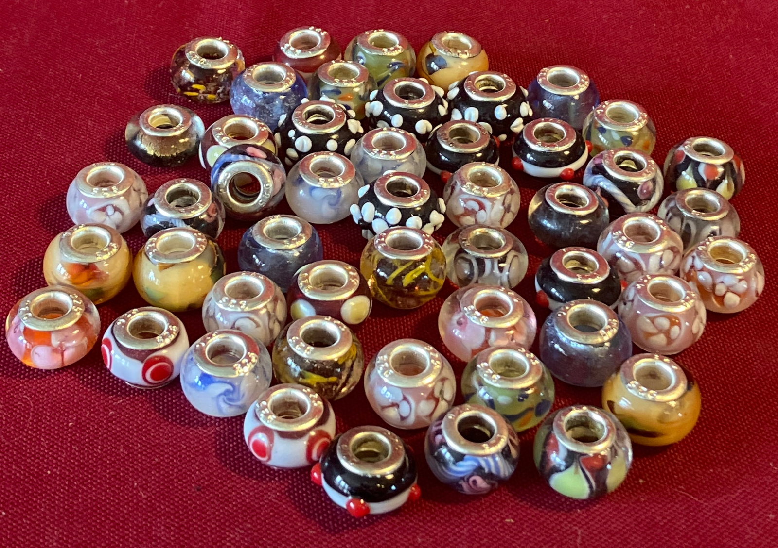 Approximately Fifty Lampwork Style Glass Beads for Bracelets - Marked 925: Approximately Fifty Lampwork Style Glass Beads for Bracelets - Marked 925