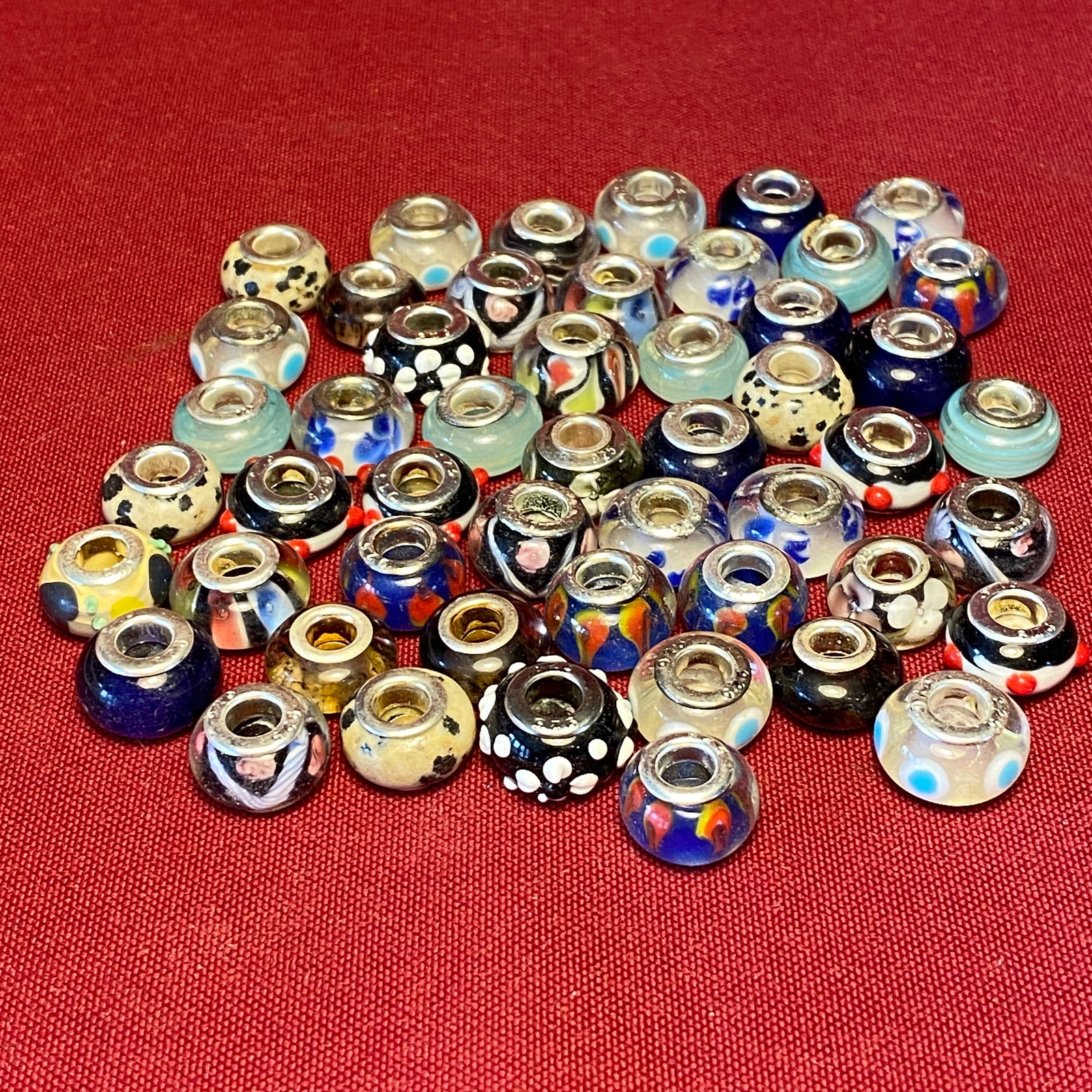 Approximately Fifty Lampwork Style Glass Beads for Bracelets - Marked 925: Approximately Fifty Lampwork Style Glass Beads for Bracelets - Marked 925