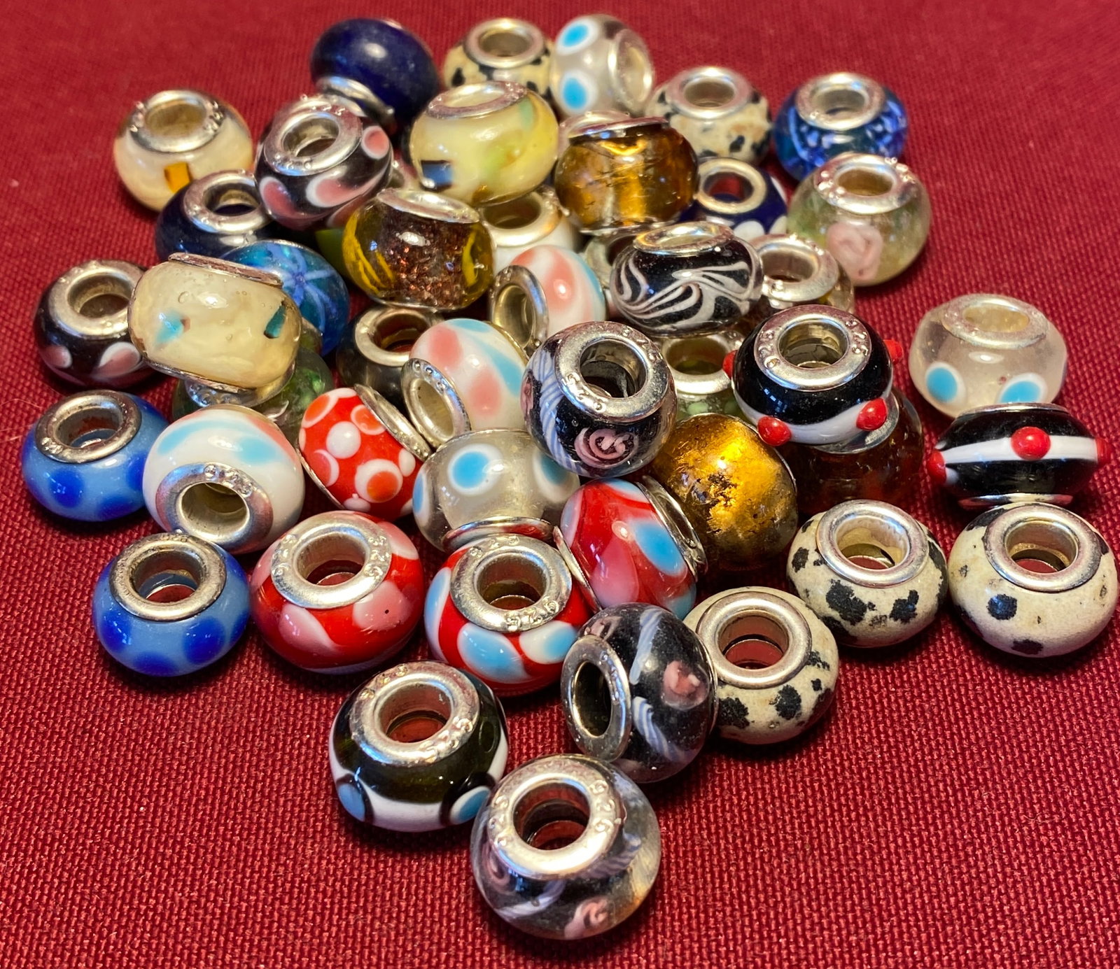 Approximately Fifty Lampwork Style Glass Beads for Bracelets - Marked 925: Approximately Fifty Lampwork Style Glass Beads for Bracelets - Marked 925