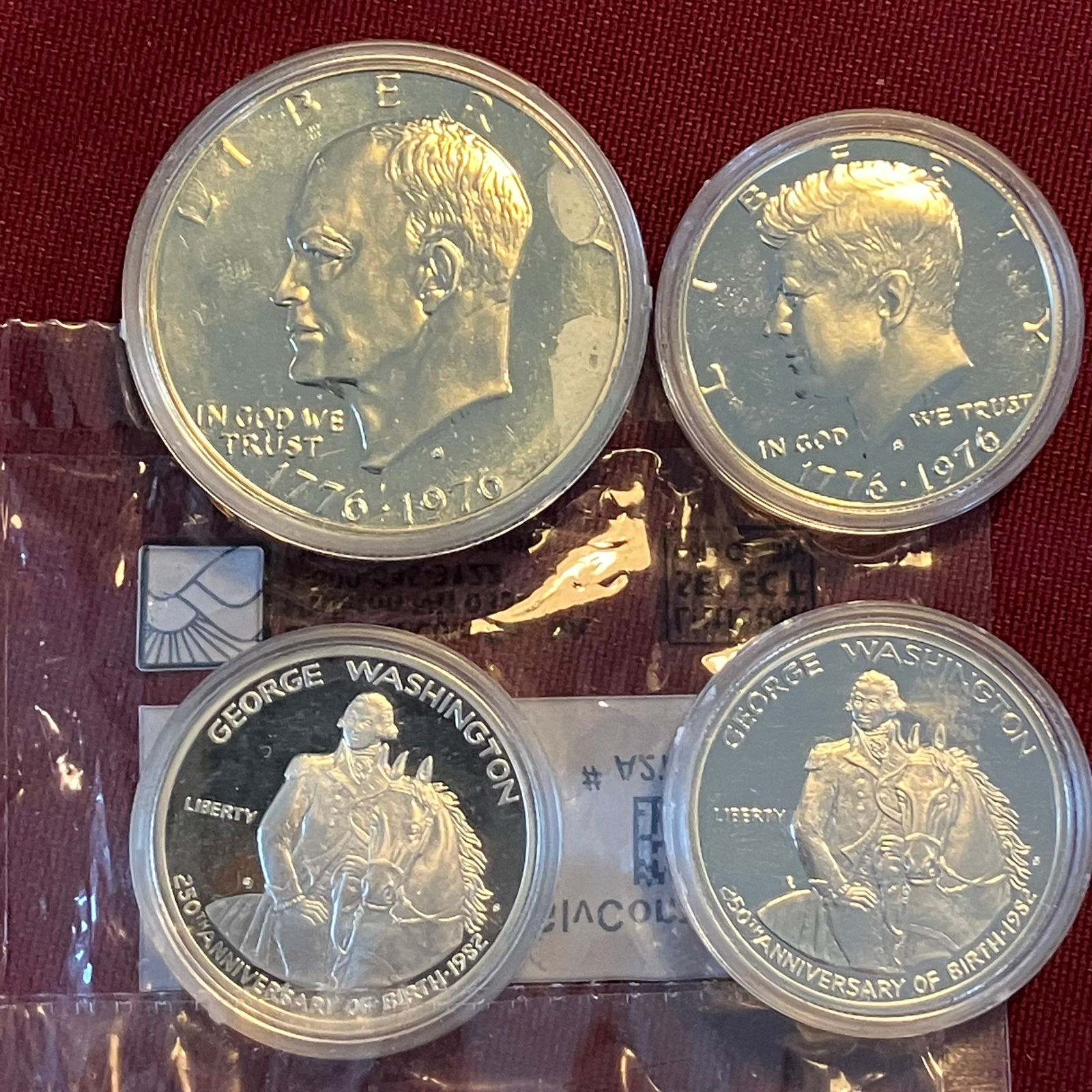 Four U.S. Coins - 1976-S Eisenhower Dollar, 1976-S Kennedy Half, and Two 1982-S Washington Silver (1 of 7)