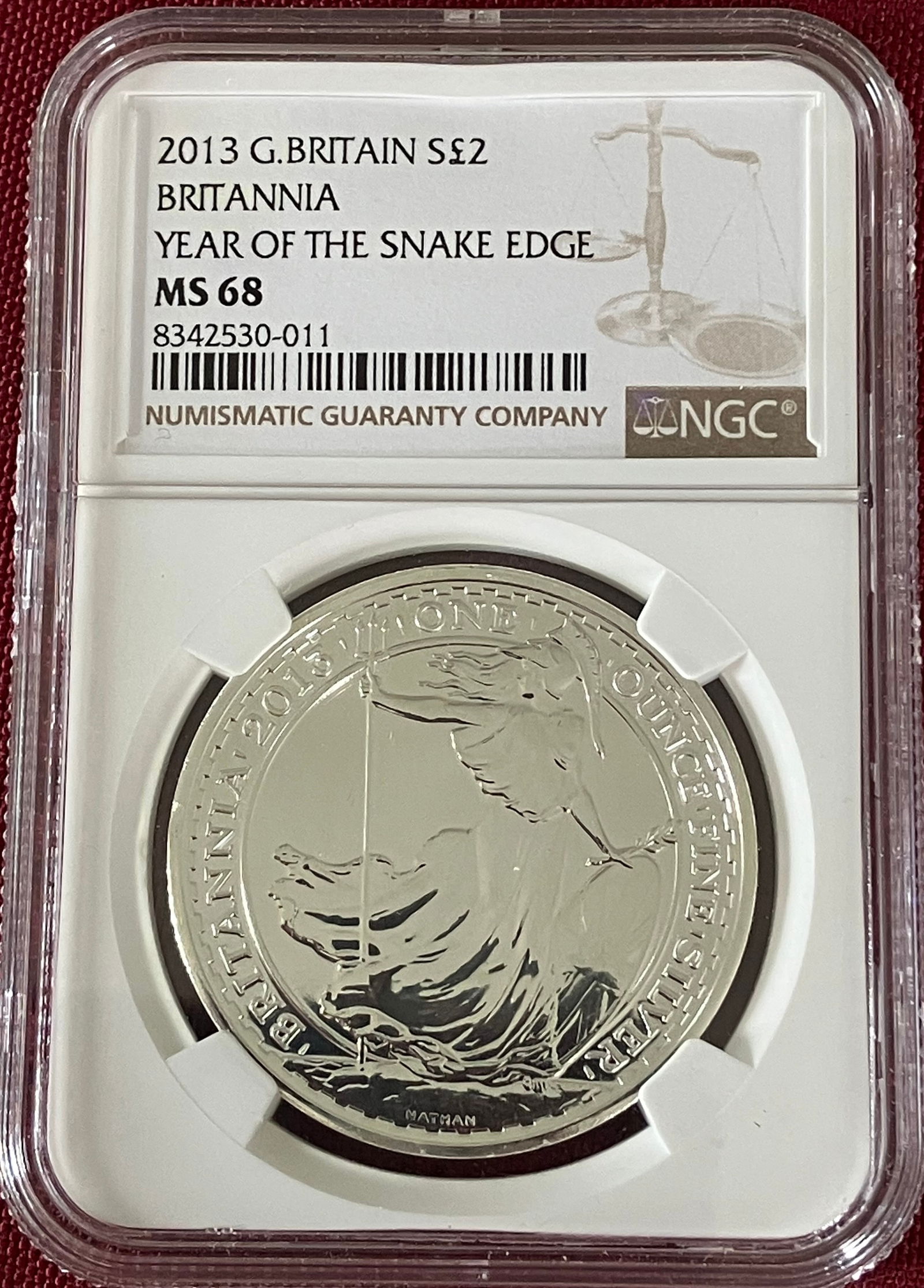Graded 2013 One Ounce .999 Fine Silver 2 Pound Britainnia - Year of the Snake (Edge) - MS68 by NGC: Graded 2013 One Ounce .999 Fine Silver 2 Pound Britainnia - Year of the Snake (Edge) - MS68 by NGC