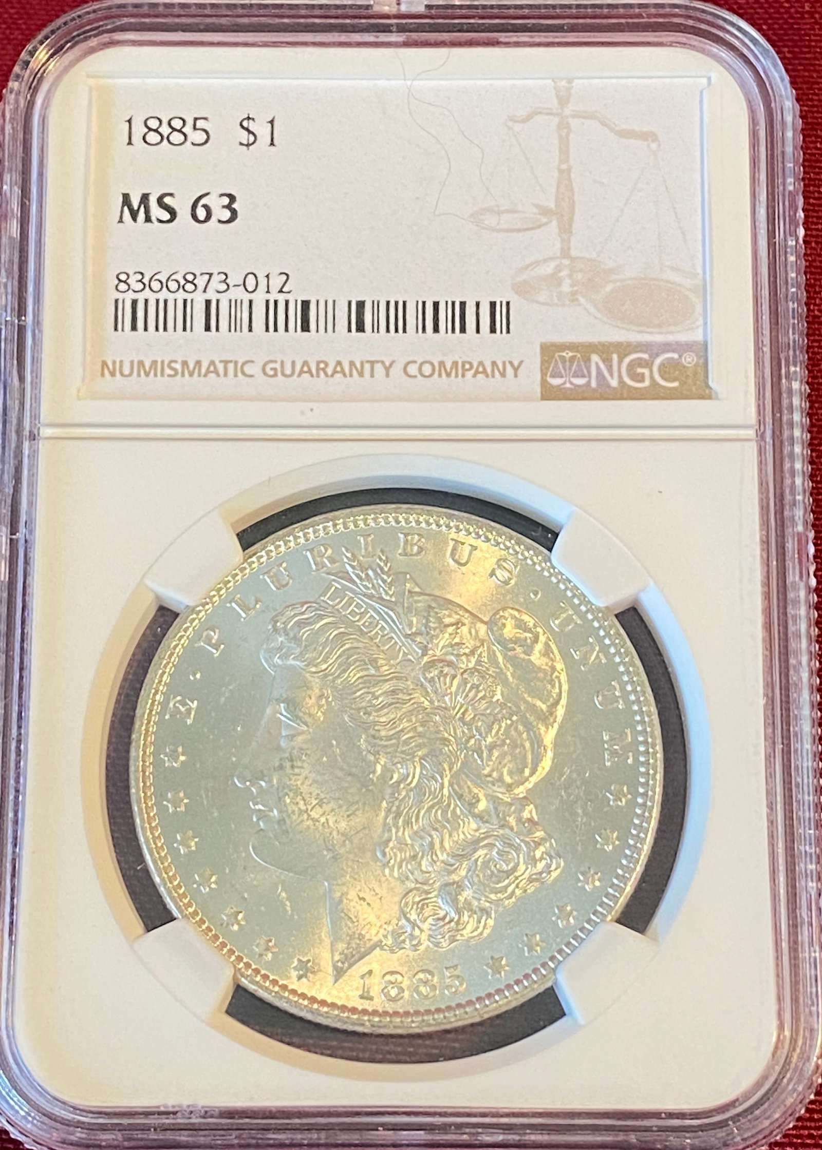 Graded 1885 Morgan Silver Dollar - MS63 by NGC (1 of 3)