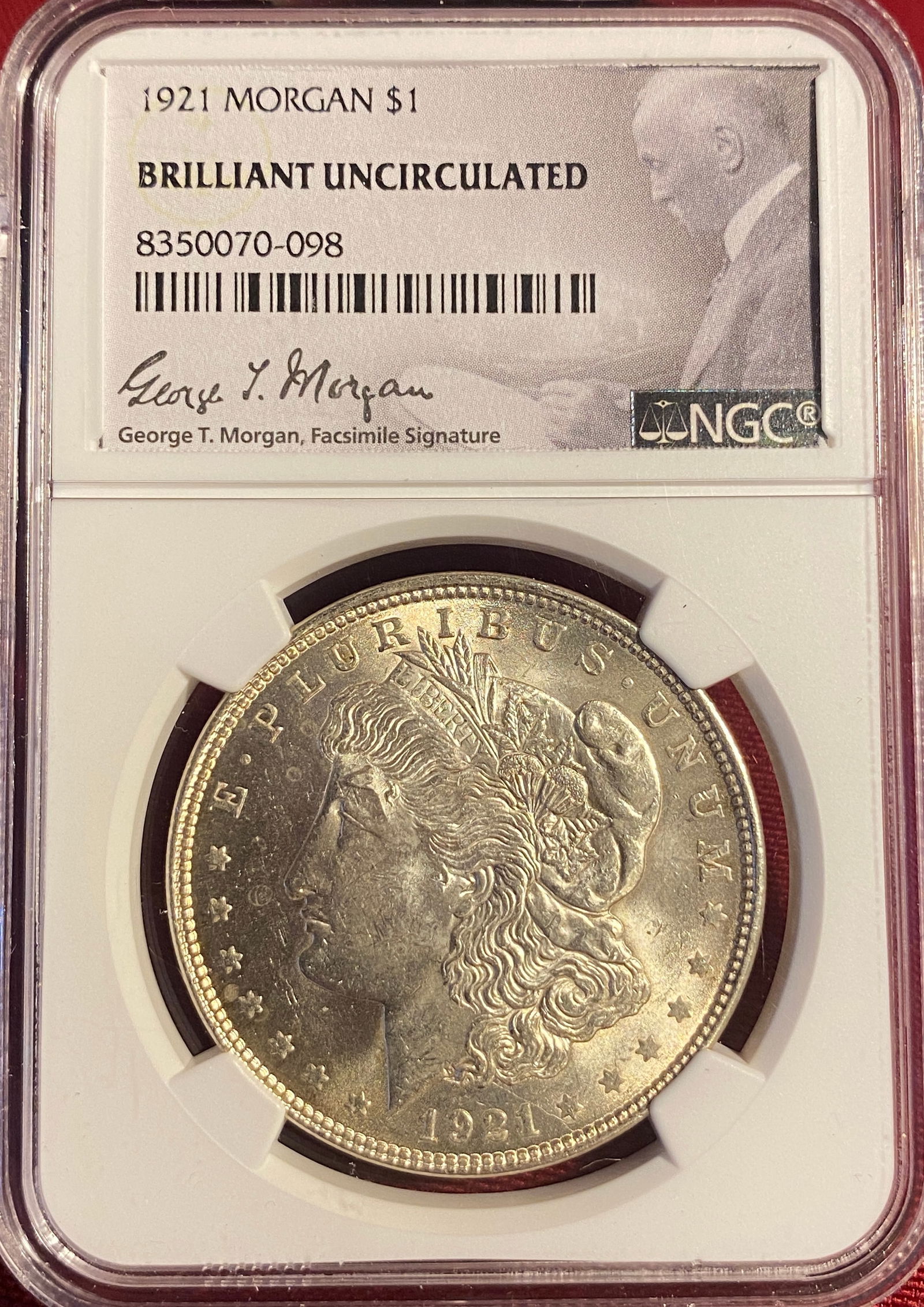 Graded 1921 Morgan Silver Dollar - Brilliant Uncirculated by NGC (1 of 3)