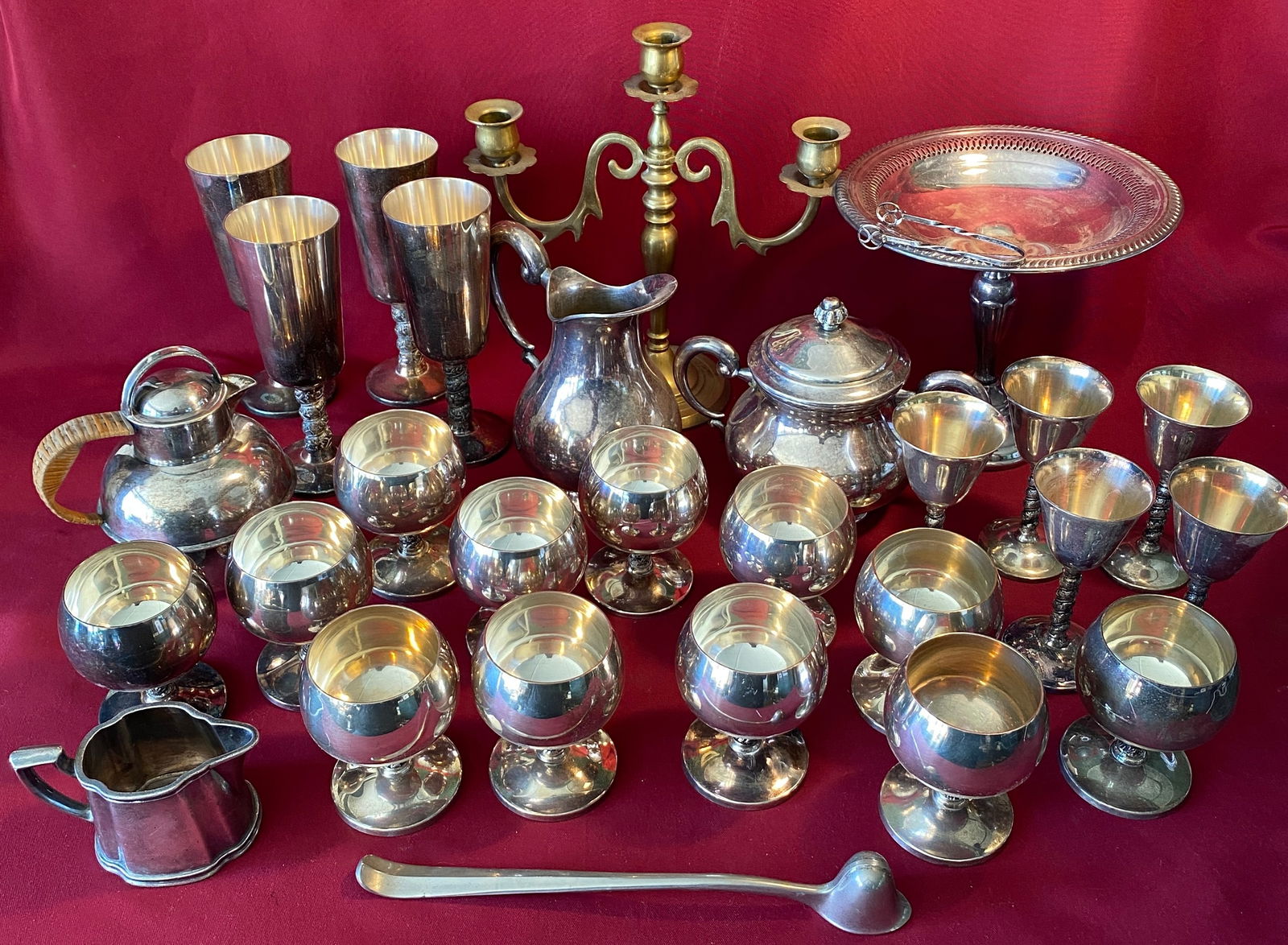 Large Lot of Silver-Plate Serveware and One Brass Candelabra: Large Lot of Silver-Plate Serveware and One Brass Candelabra