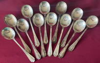 Twelve Sterling Silver Tiffany & Co. Gumbo Spoons - 'Flemish' Pattern - Approx 910 Grams -