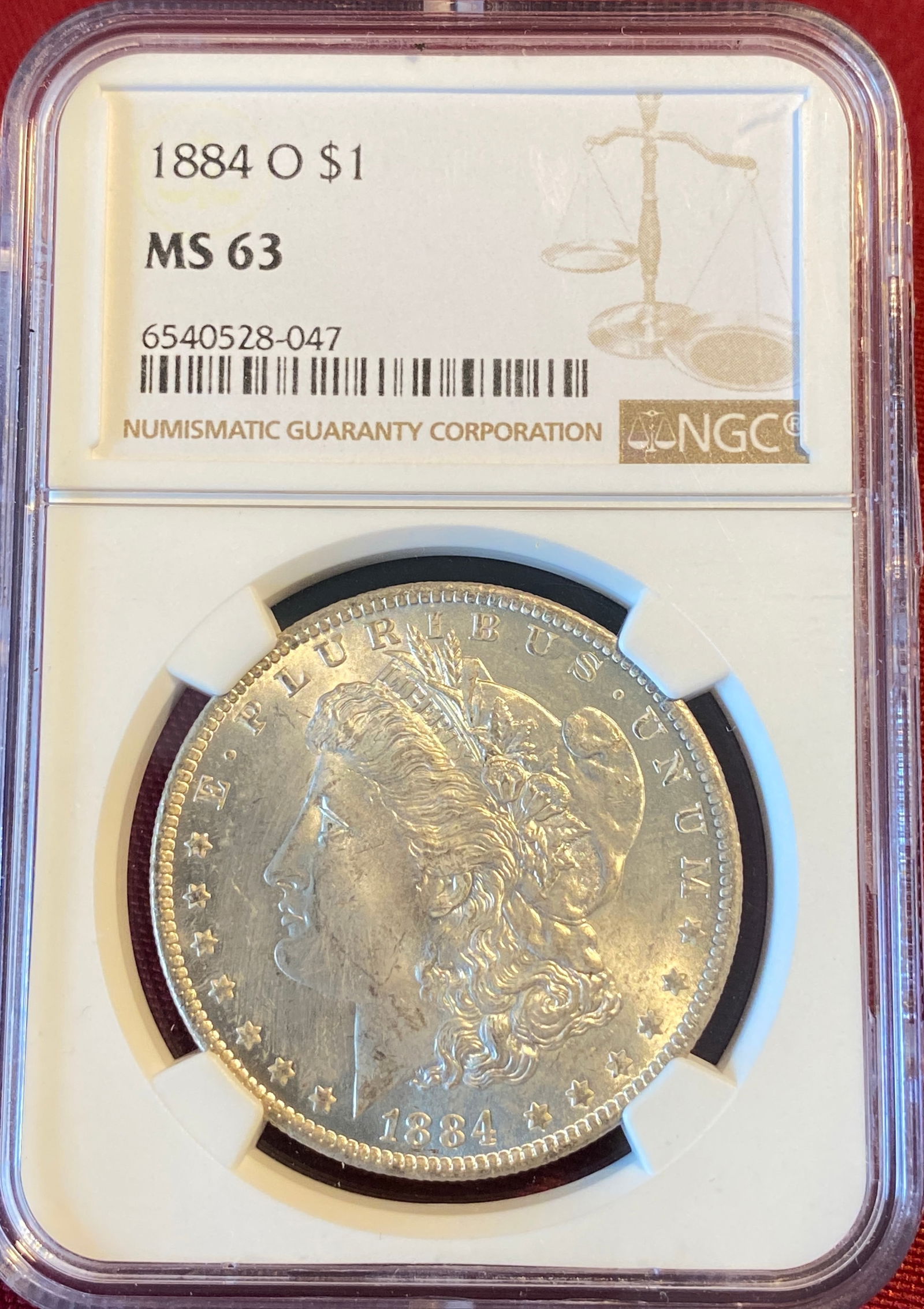 Graded 1884-O Morgan Silver Dollar - MS63 by NGC (1 of 3)