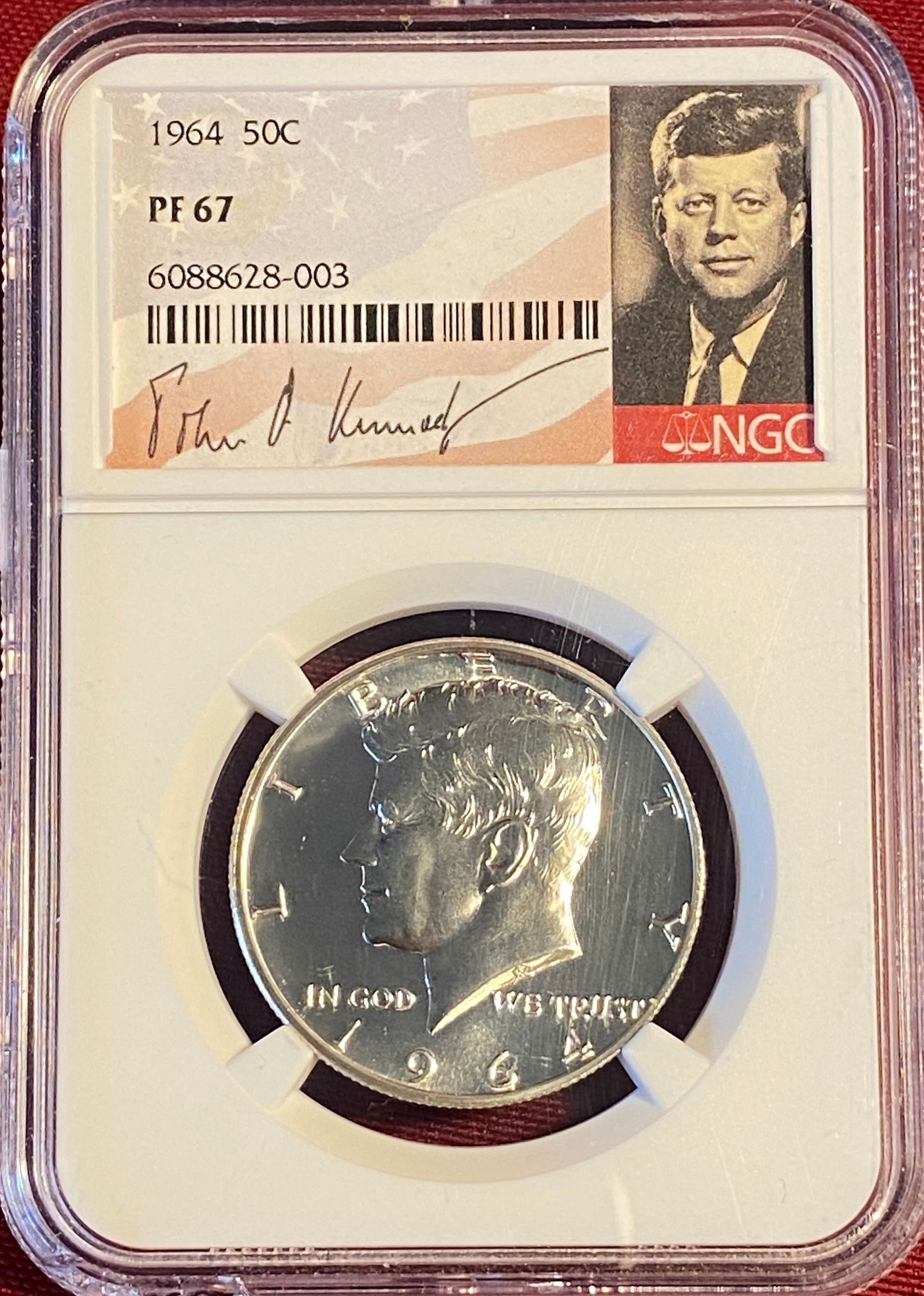 Graded 1964 Kennedy Silver Half Dollar - PF67 by NGC (1 of 3)