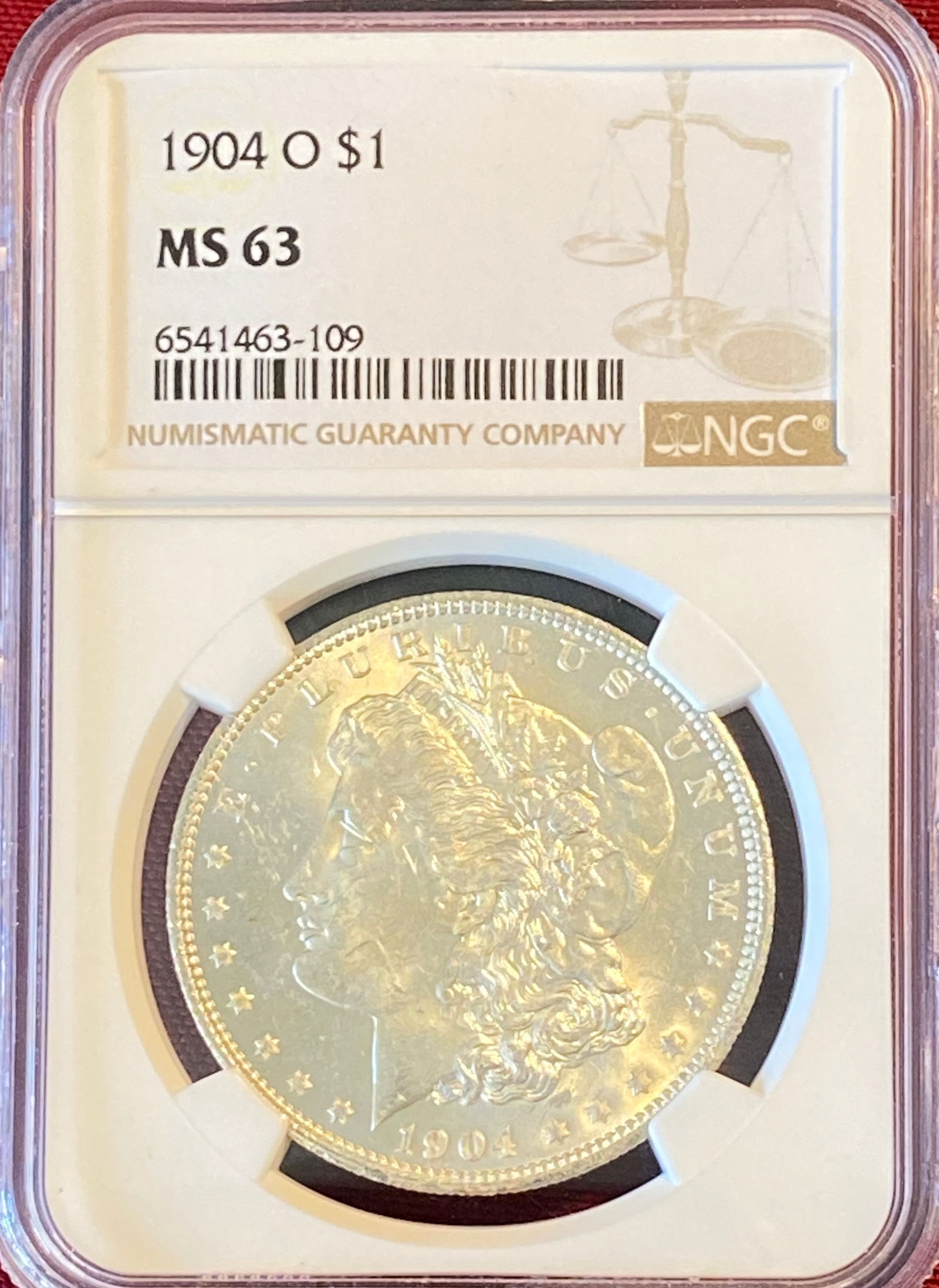 Graded 1904-O Morgan Silver Dollar - MS63 by NGC (1 of 3)