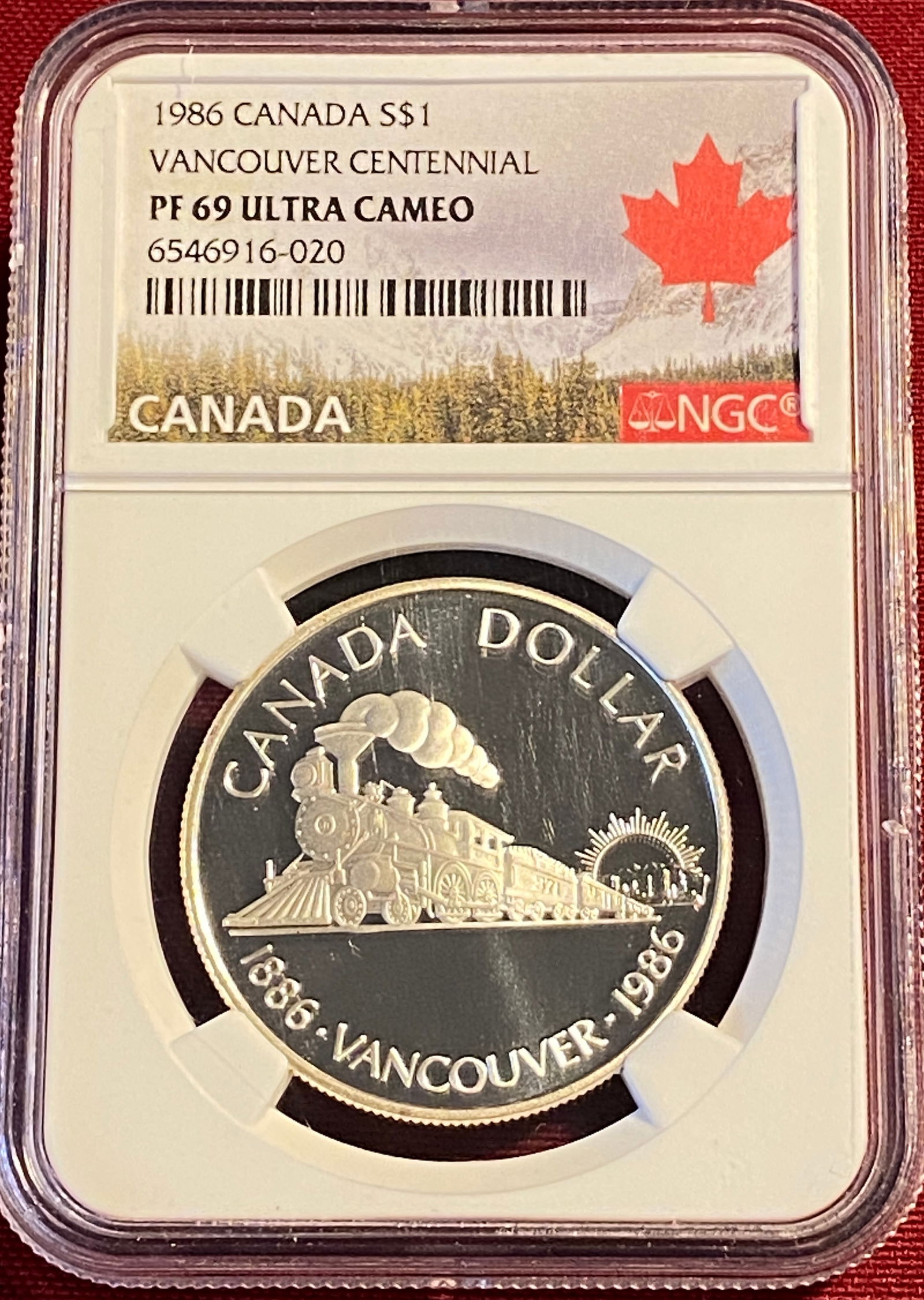 Graded 1986 Canada Silver Dollar - Vancouver Centennial - PF69 Ultra Cameo by NGC (1 of 3)
