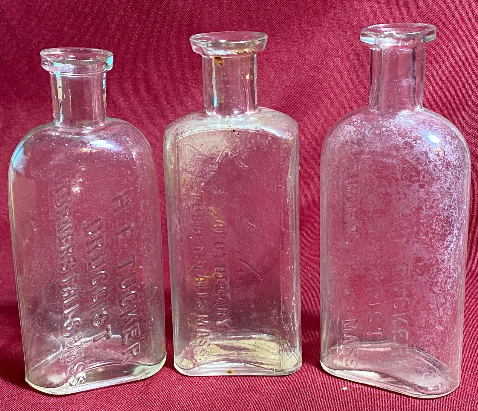 Three Antique Embossed Turners Falls Ma Medical Glass Bottles - H.E. Tucker Druggist & Darling (1 of 9)