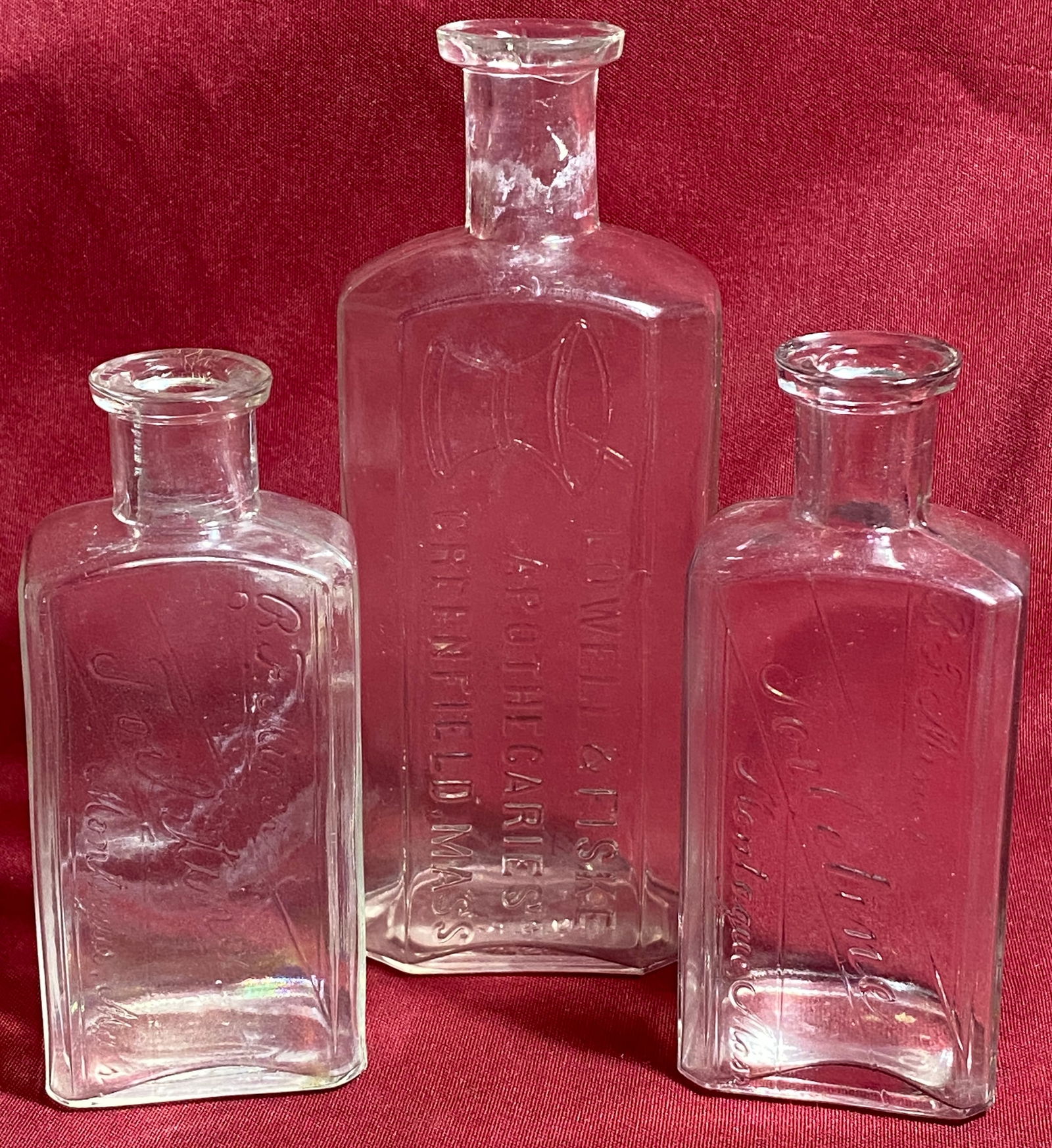 Three Antique Embossed Glass Bottles - B.F. Miner Toiletine Montague Mass and Lowell & Fiske (1 of 11)