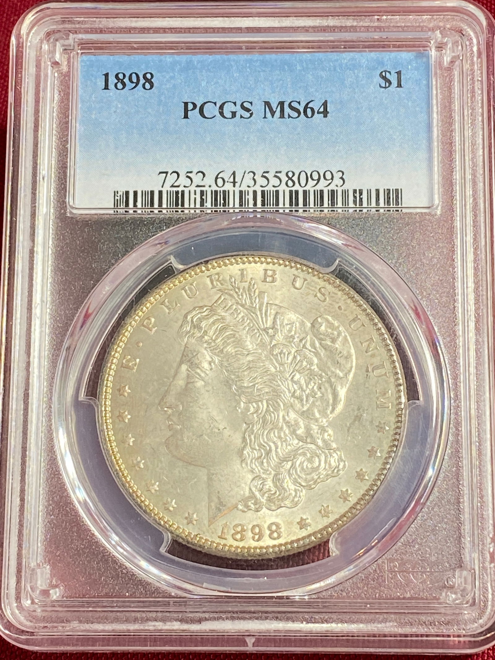 Graded 1898 Morgan Silver Dollar - MS64 by PCGS (1 of 3)
