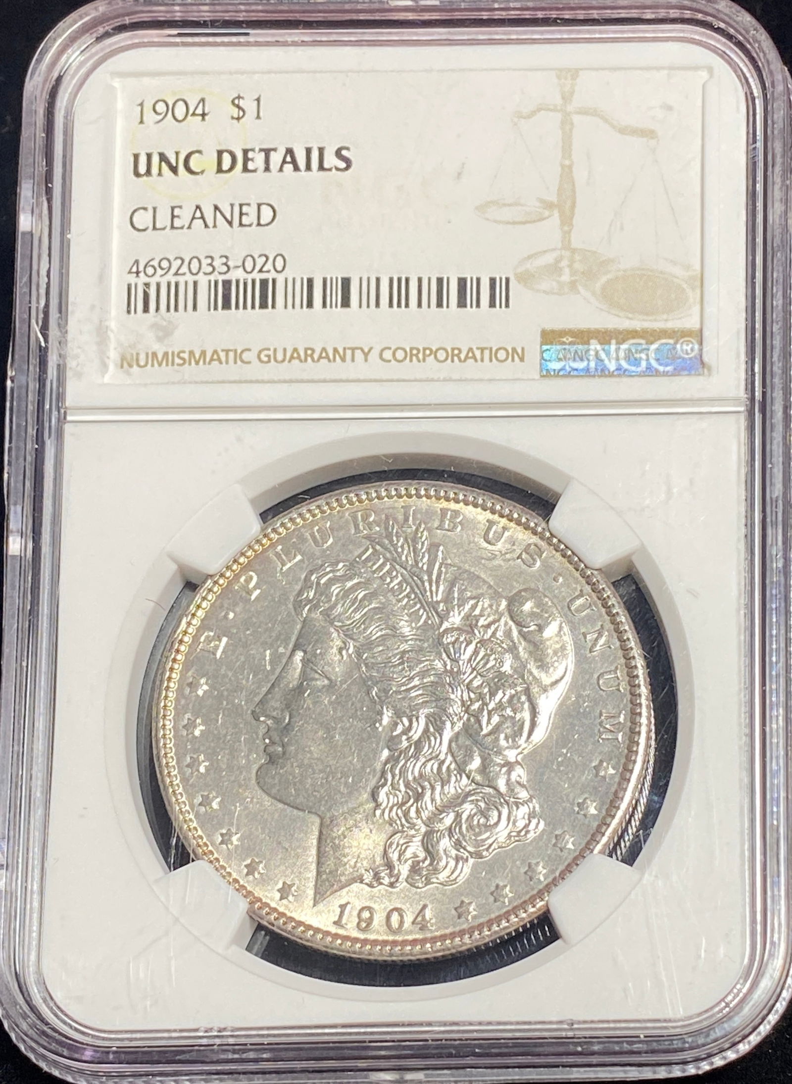 Graded 1904 Morgan Silver Dollar - NGC - UNC Condition - Cleaned (1 of 3)