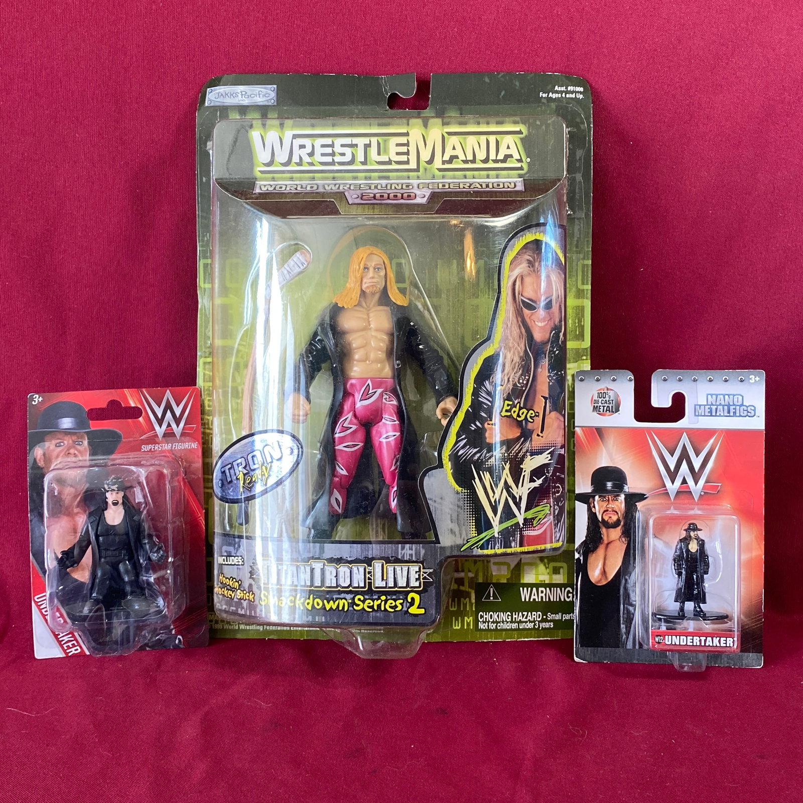 Three Wrestling Figures in Original Packages - (2) Undertaker & (1) Titan Tron (1 of 8)