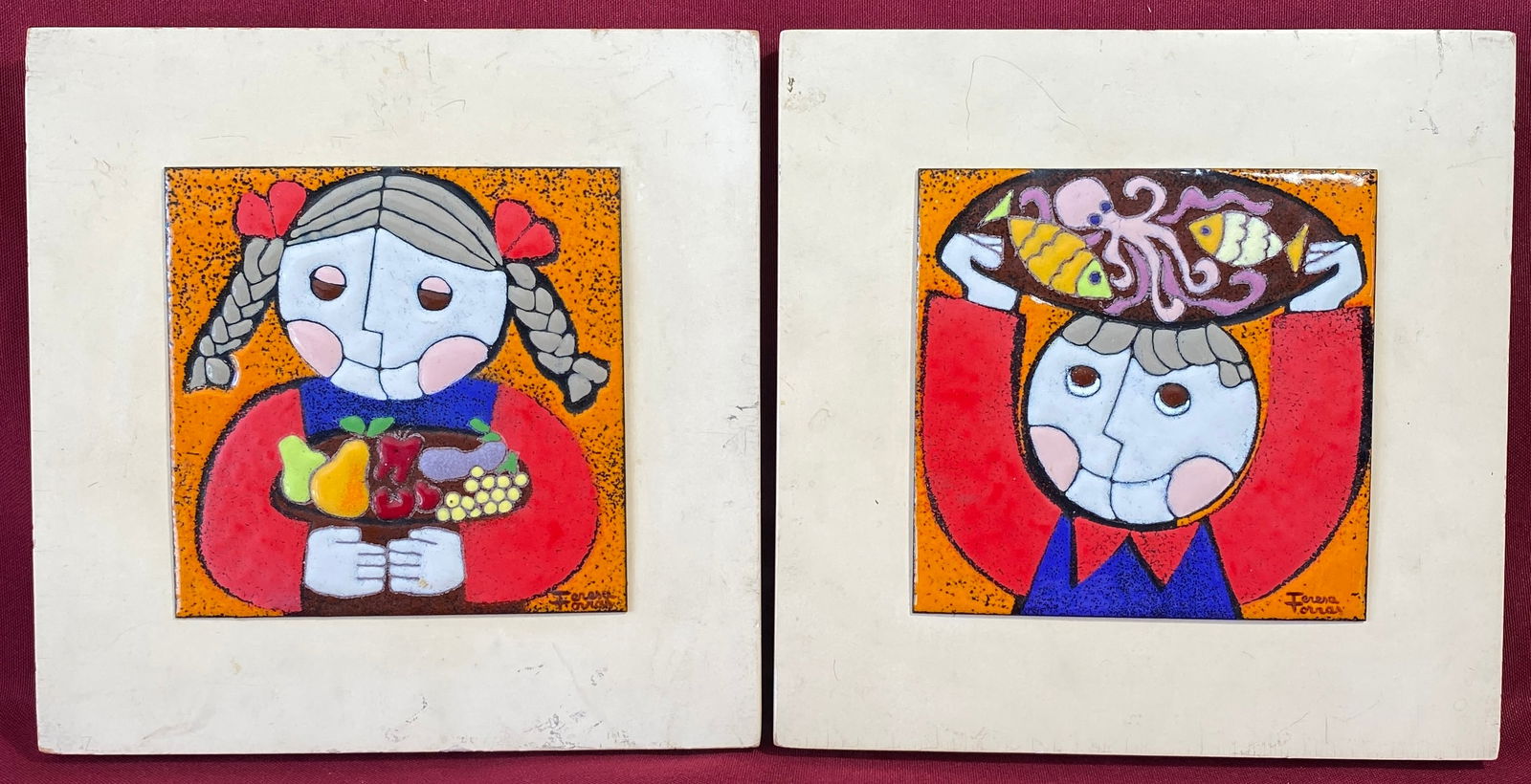 Two Enamel on Copper Tiles - Girl with Bowl of Fruit and Boy with Platter of Seafood/Fish - Mounted: Two Enamel on Copper Tiles - Girl with Bowl of Fruit and Boy with Platter of Seafood/Fish - Mounted for Hanging