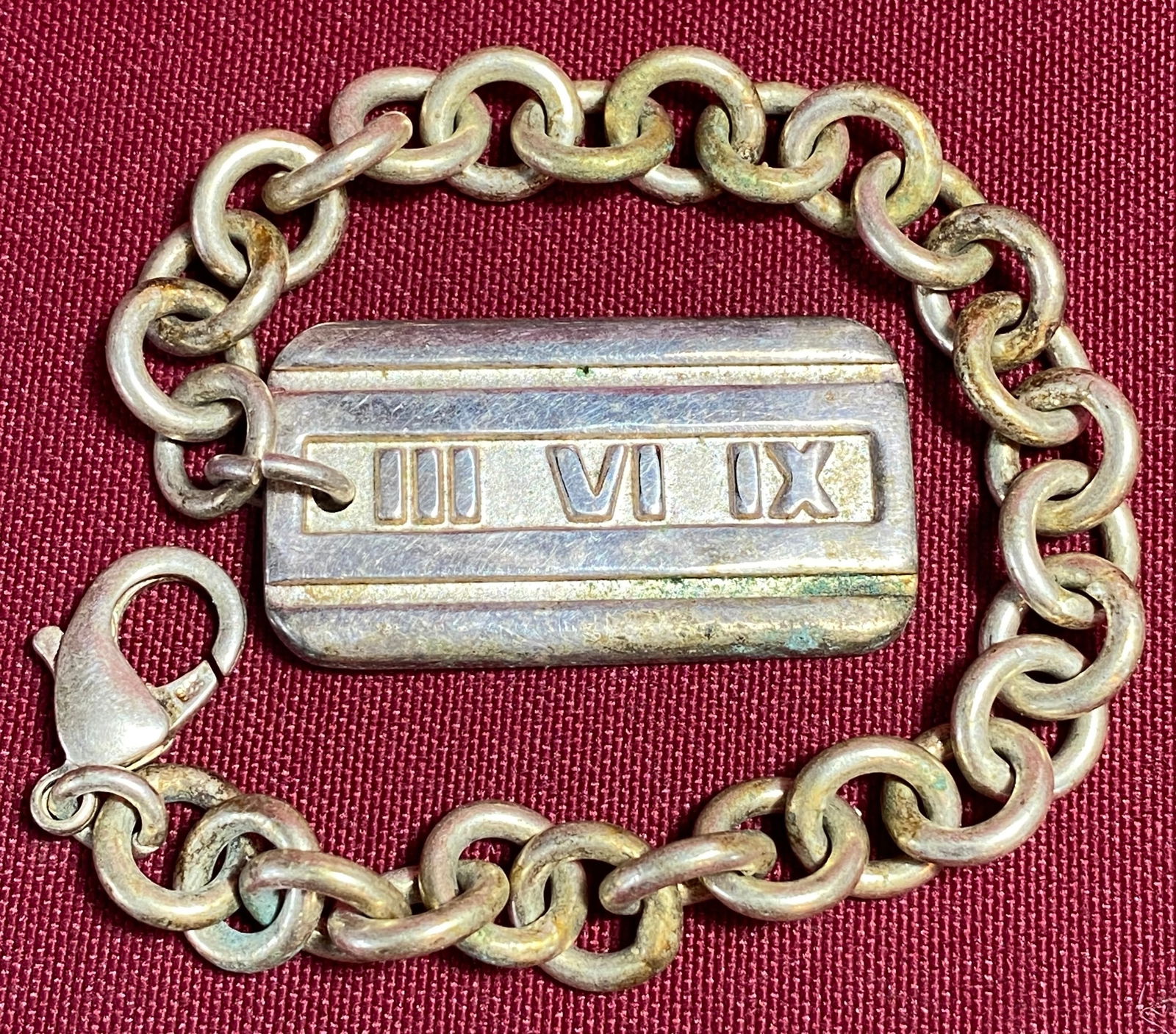 Tiffany & Co. Marked III VI IX Atlas Plate (Marked .925) on 7.5" Bracelet Marked .925: Tiffany & Co. Marked III VI IX Atlas Plate (Marked .925) on 7.5" Bracelet Marked .925