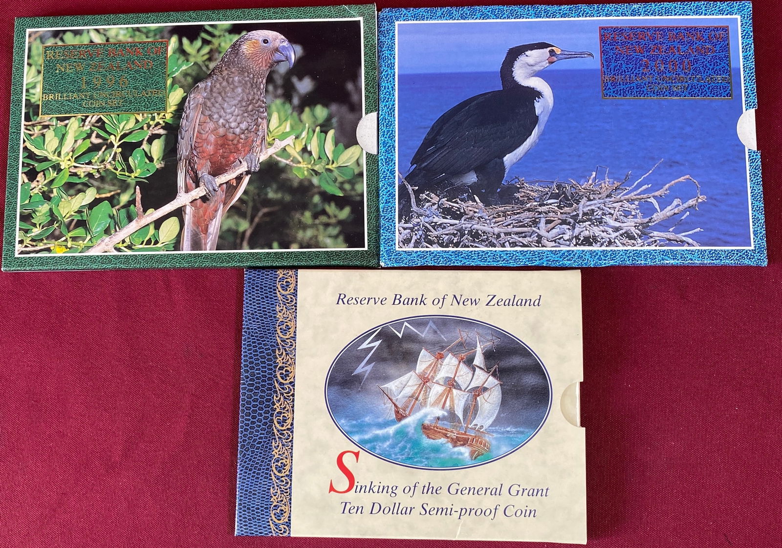 Three Reserve Bank of New Zealand Coin Sets - Sinking of the General Grant $10 Semi-Proof Coin, 1996: Three Reserve Bank of New Zealand Coin Sets - Sinking of the General Grant $10 Semi-Proof Coin, 1996 & 2000 Brilliant Uncirculated Coin Sets