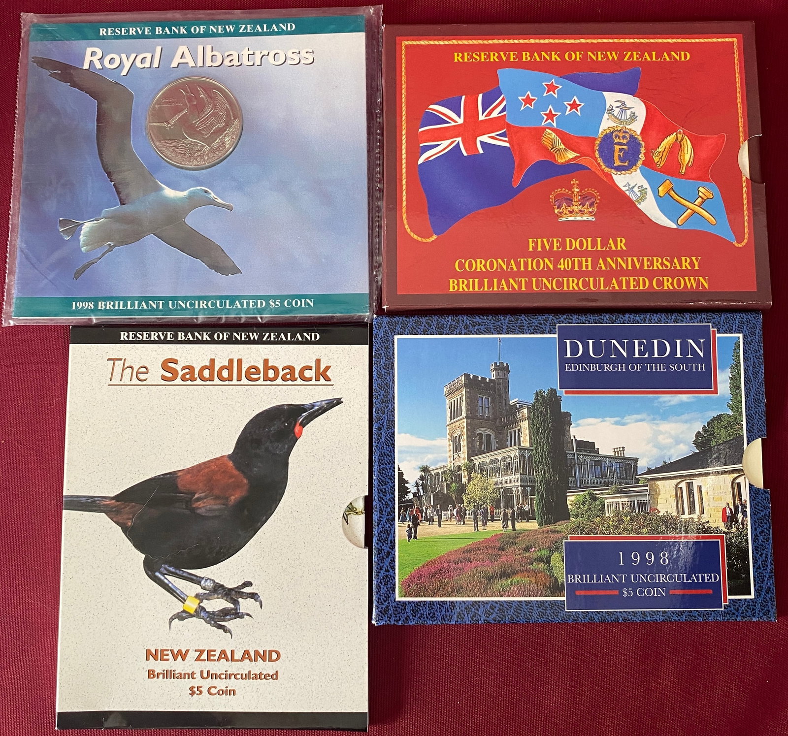 Four Uncirculated Bank of New Zealand Coins/Sets - 1997, 1998, 1998 Dunedin Edinburgh of the South,: Four Uncirculated Bank of New Zealand Coins/Sets - 1997, 1998, 1998 Dunedin Edinburgh of the South, 1993 Coronation Crown 40th