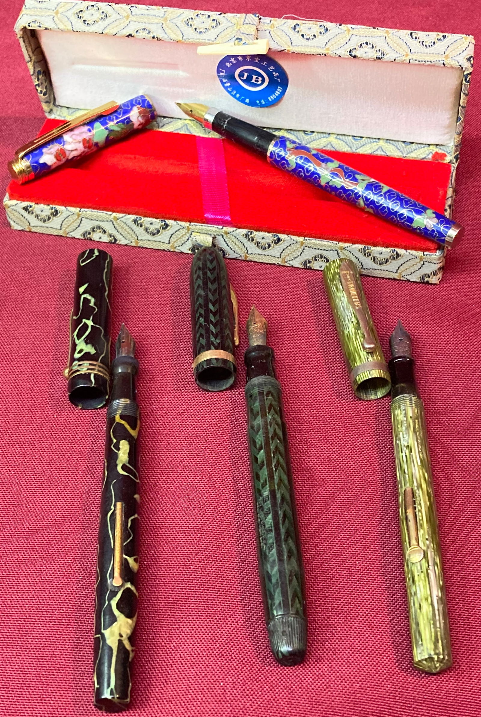 Four Older Fountain Pens Including Two with 14K Gold Nibs - Travelers, Conkum, Swan: Four Older Fountain Pens Including Two with 14K Gold Nibs - Travelers, Conkum, Swan