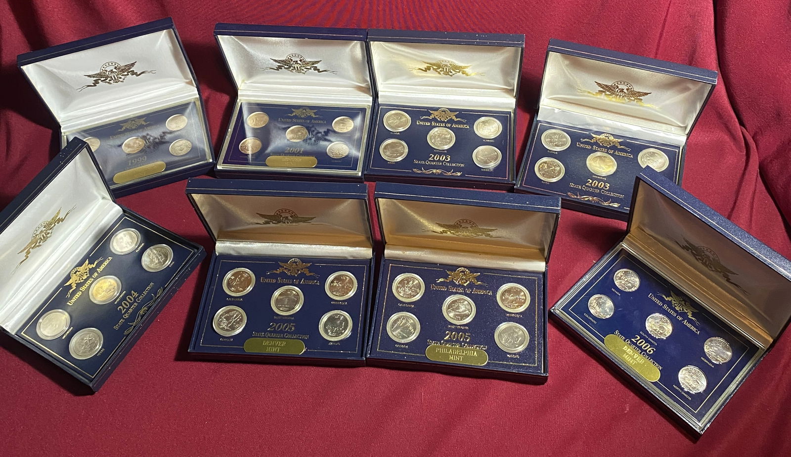 Eight U.S. State Quarter Collections - 1999-P, 2001-D, 2003-P & D, 2004-D, 2005-P & D, 2006-D (1 of 6)