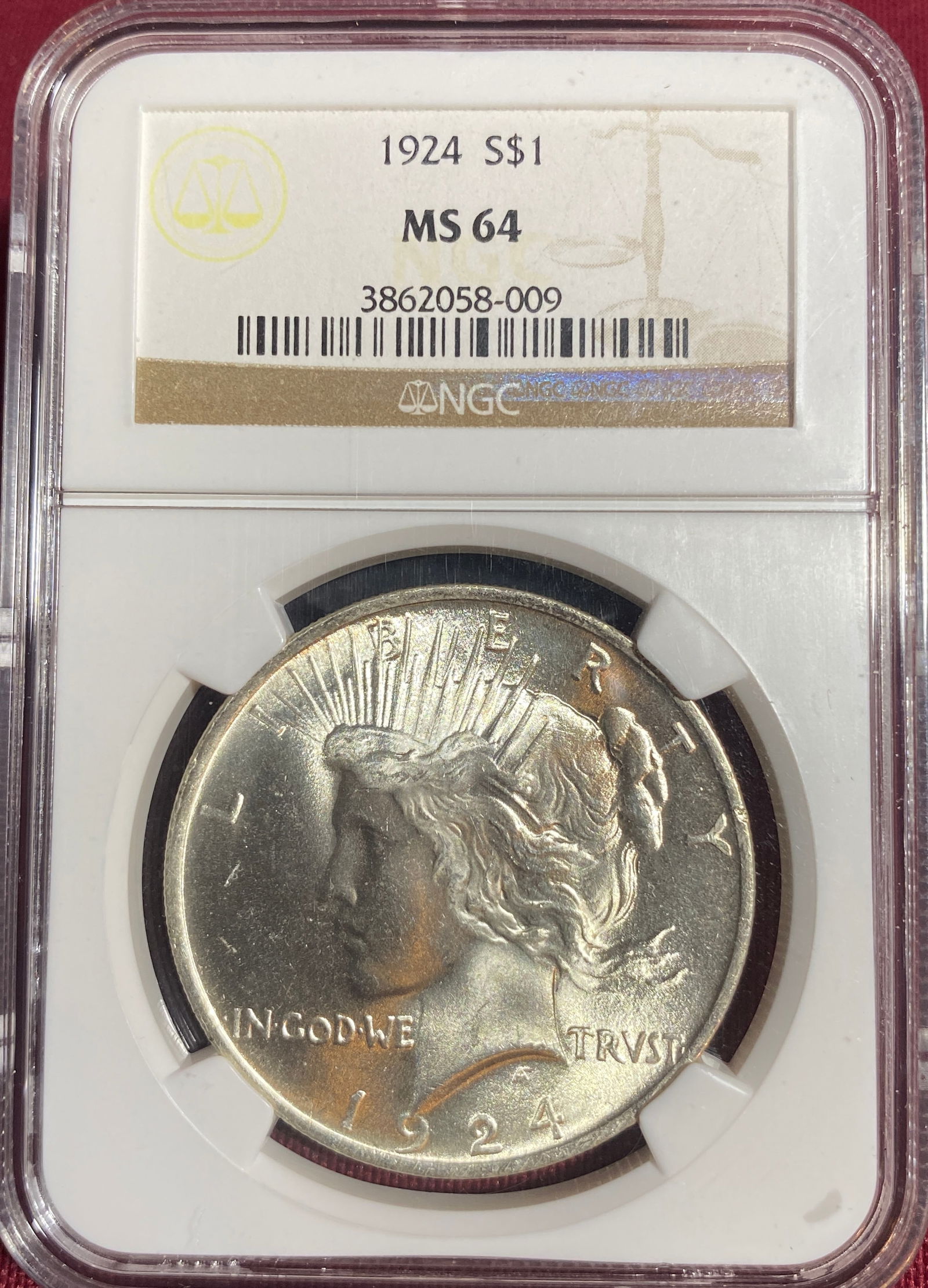 Graded 1924 Peace Silver Dollar - MS64 by NGC (1 of 3)
