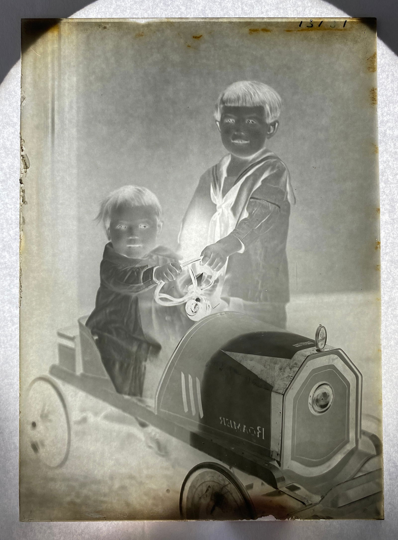 Old Glass Negative of Two Children Posing with a Roamer Pedal Car: Old Glass Negative of Two Children Posing with a Roamer Pedal Car