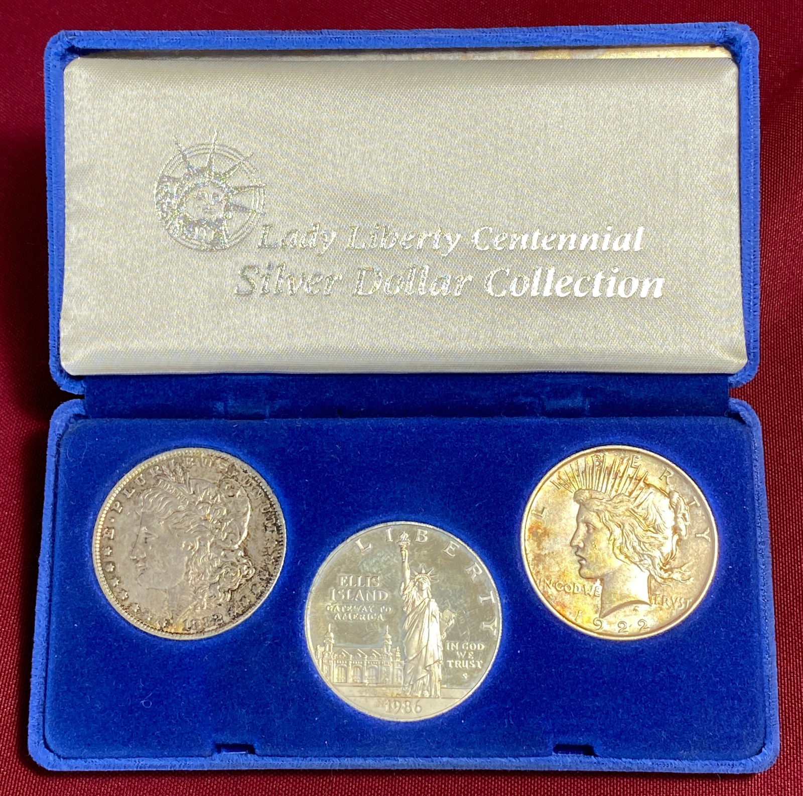 Lady Liberty Centennial Silver Dollar Collection - 1882 Morgan Silver Dollar, 1922 Peace Silver: Lady Liberty Centennial Silver Dollar Collection - 1882 Morgan Silver Dollar, 1922 Peace Silver Dollar, and 1986-S Lady Liberty Commemorative Silver Dollar