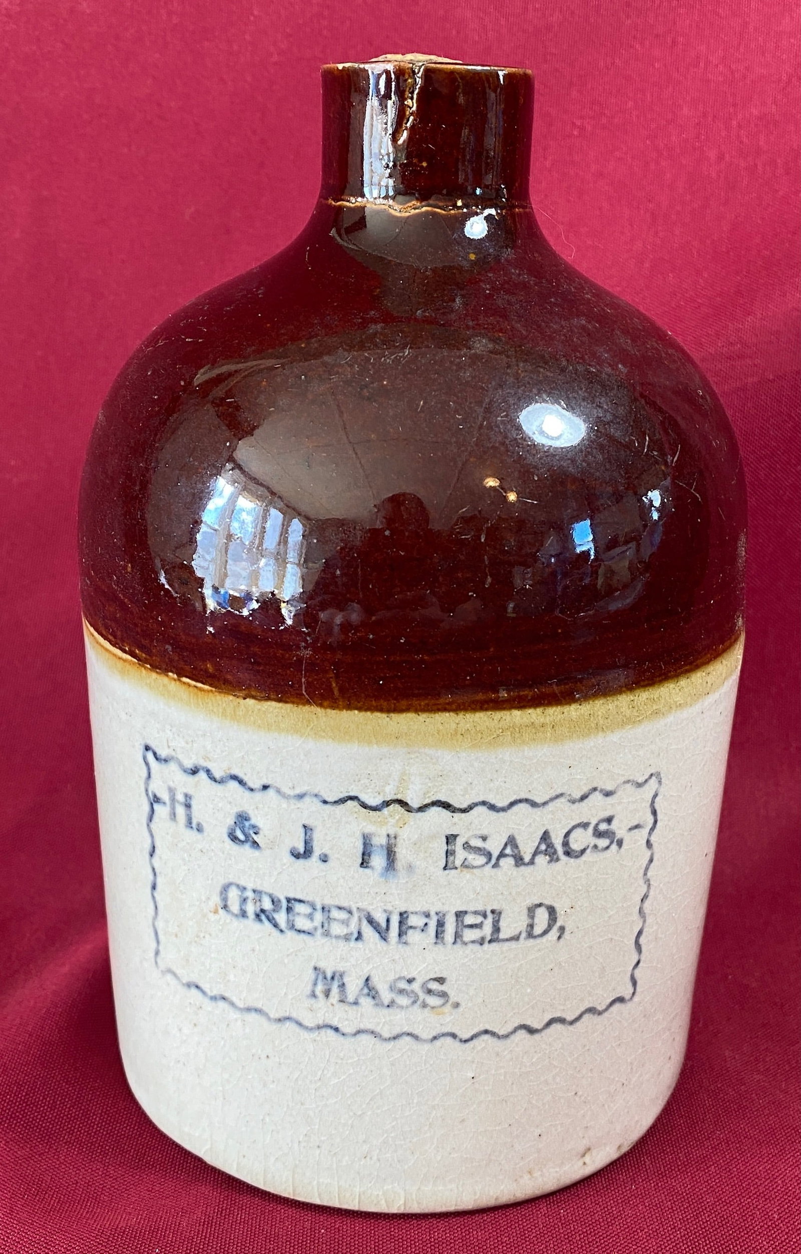H & J.H. Isaacs Greenfield, MA Advertising Jug: H & J.H. Isaacs Greenfield, MA Advertising Jug