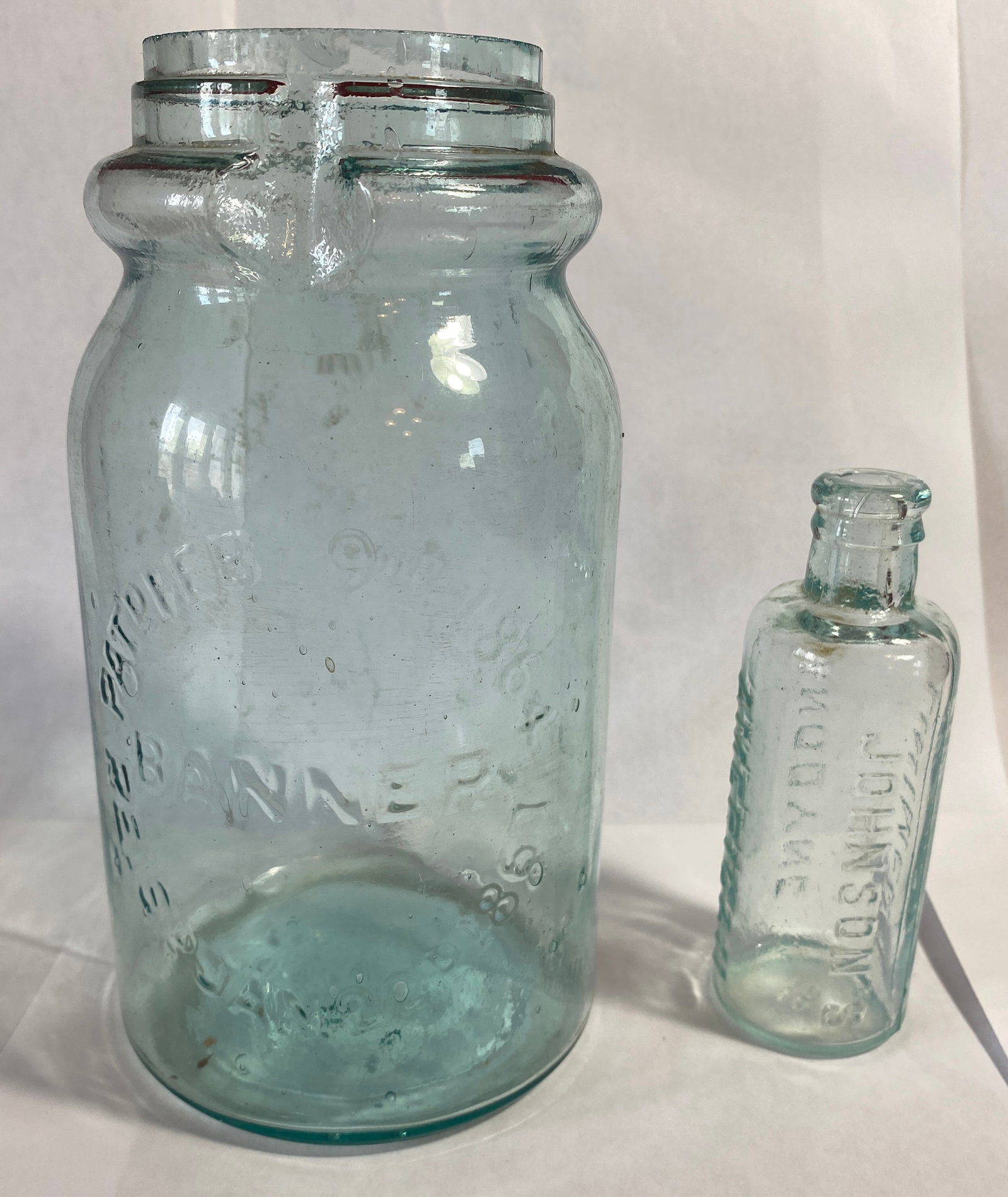 Johnson's American Anodyne Liniment Bottle & Banner Jar: Johnson's American Anodyne Liniment Bottle & Banner Jar